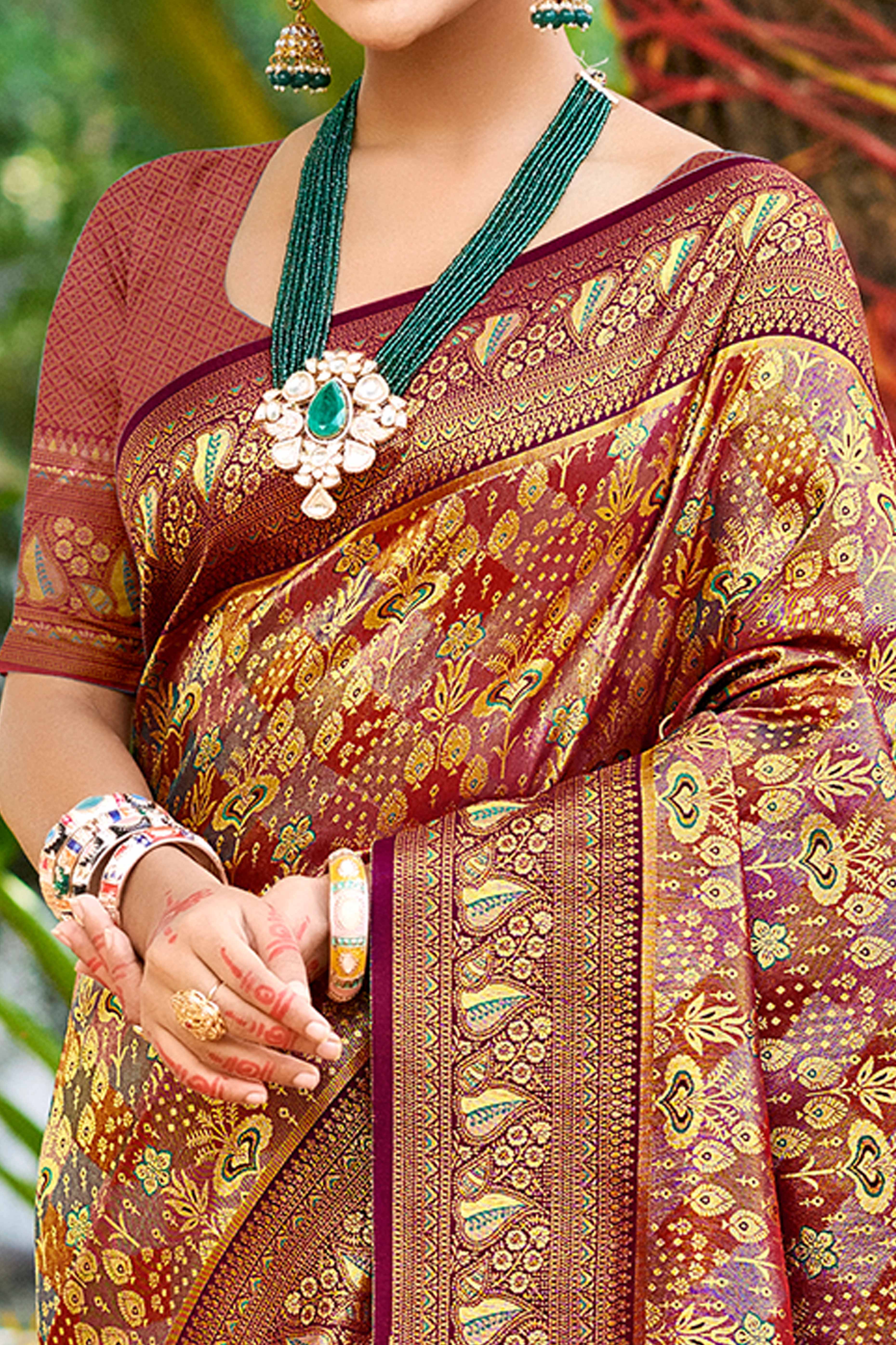 Wine Floral Weaving Silk Blend Dharmavaram Saree Accented With Tassel Pallu