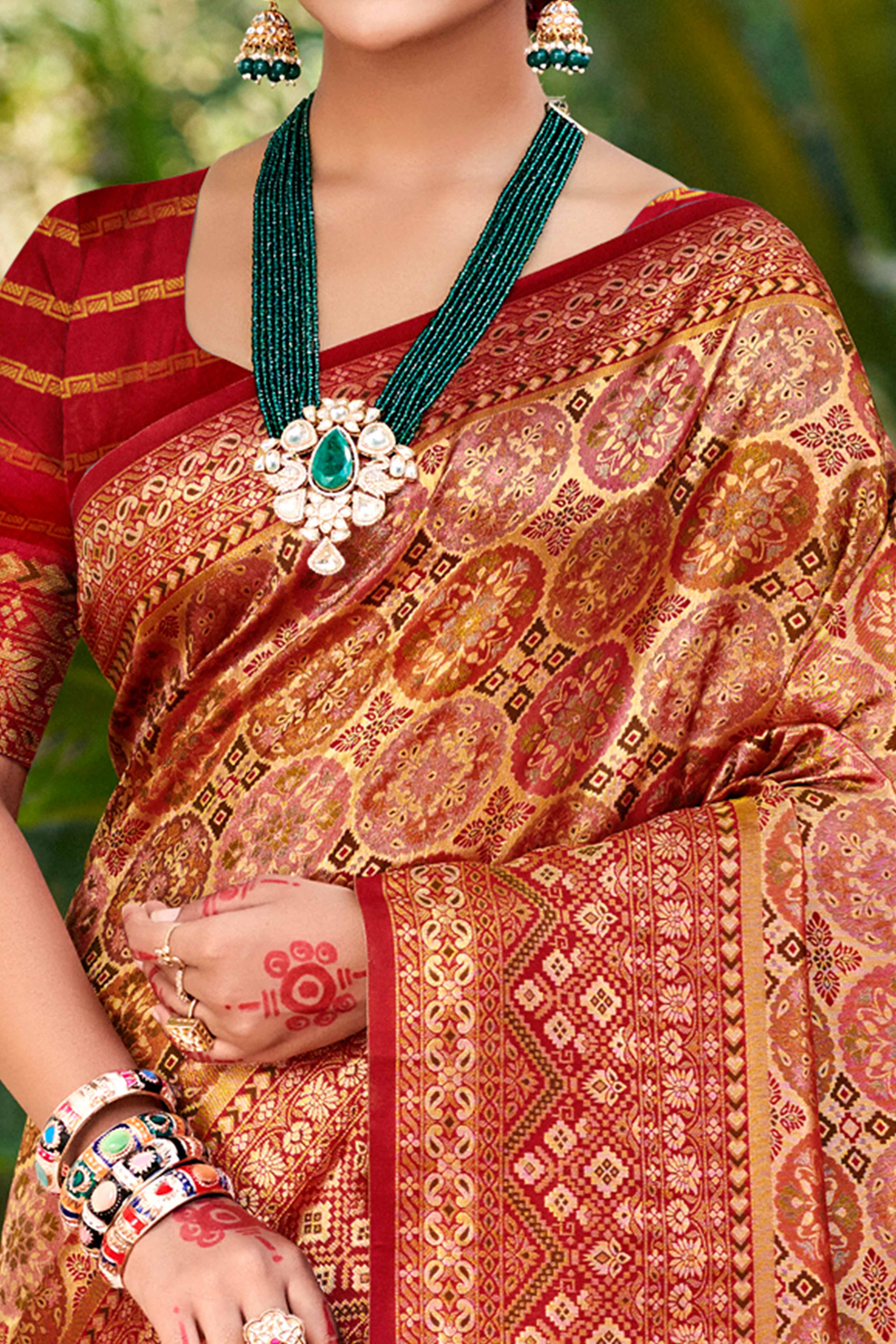Floral Patterned Maroon Woven Silk Blend Dharmavaram Saree With Tassel Elegance