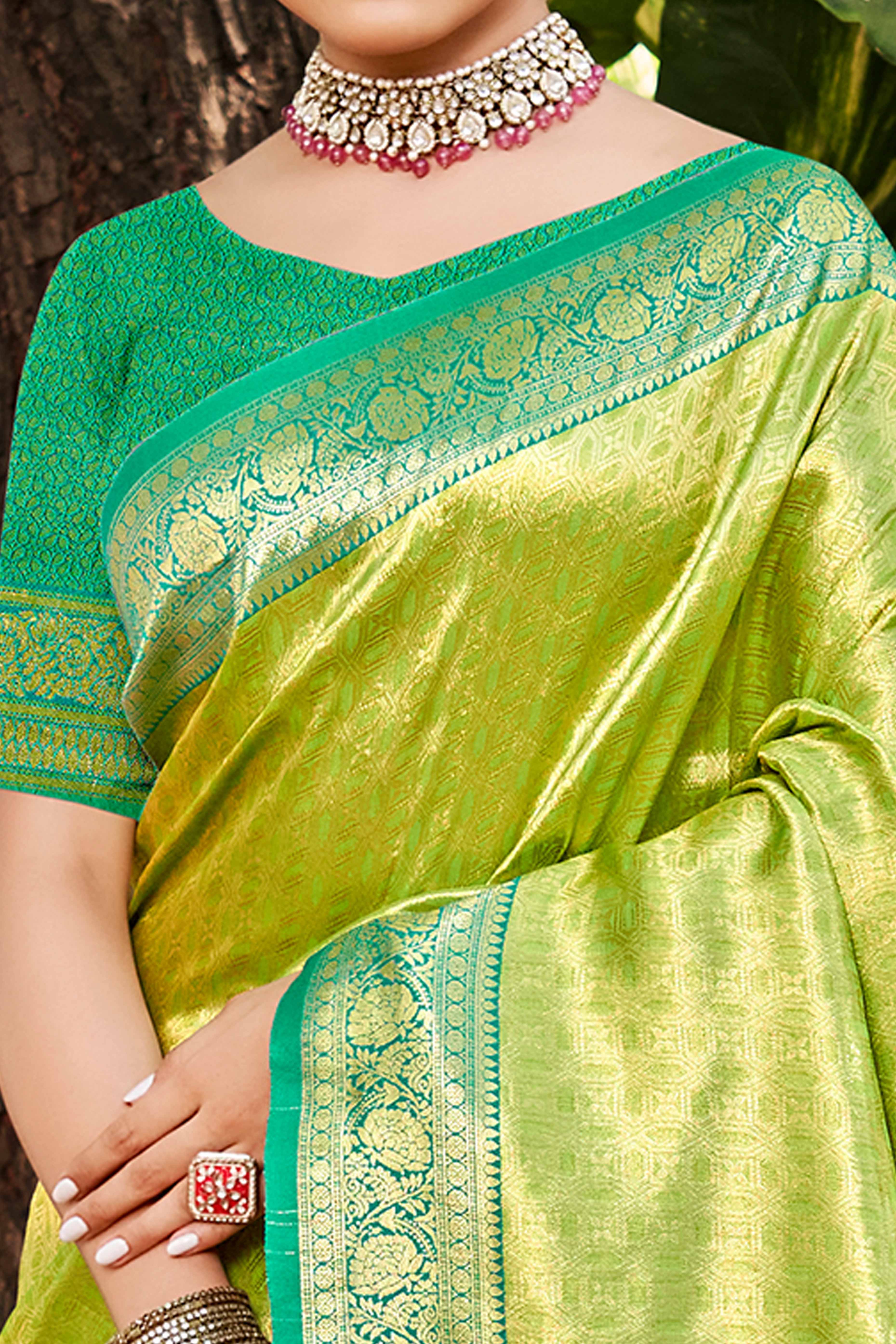 Green Paithani Saree In Kanjivaram Silk Adorned With Intricate Floral Weaving