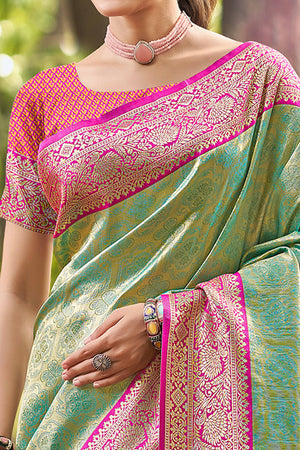 Rama Green Paithani Saree In Kanjivaram Silk Featuring Floral Woven Motifs & Tassel Pallu