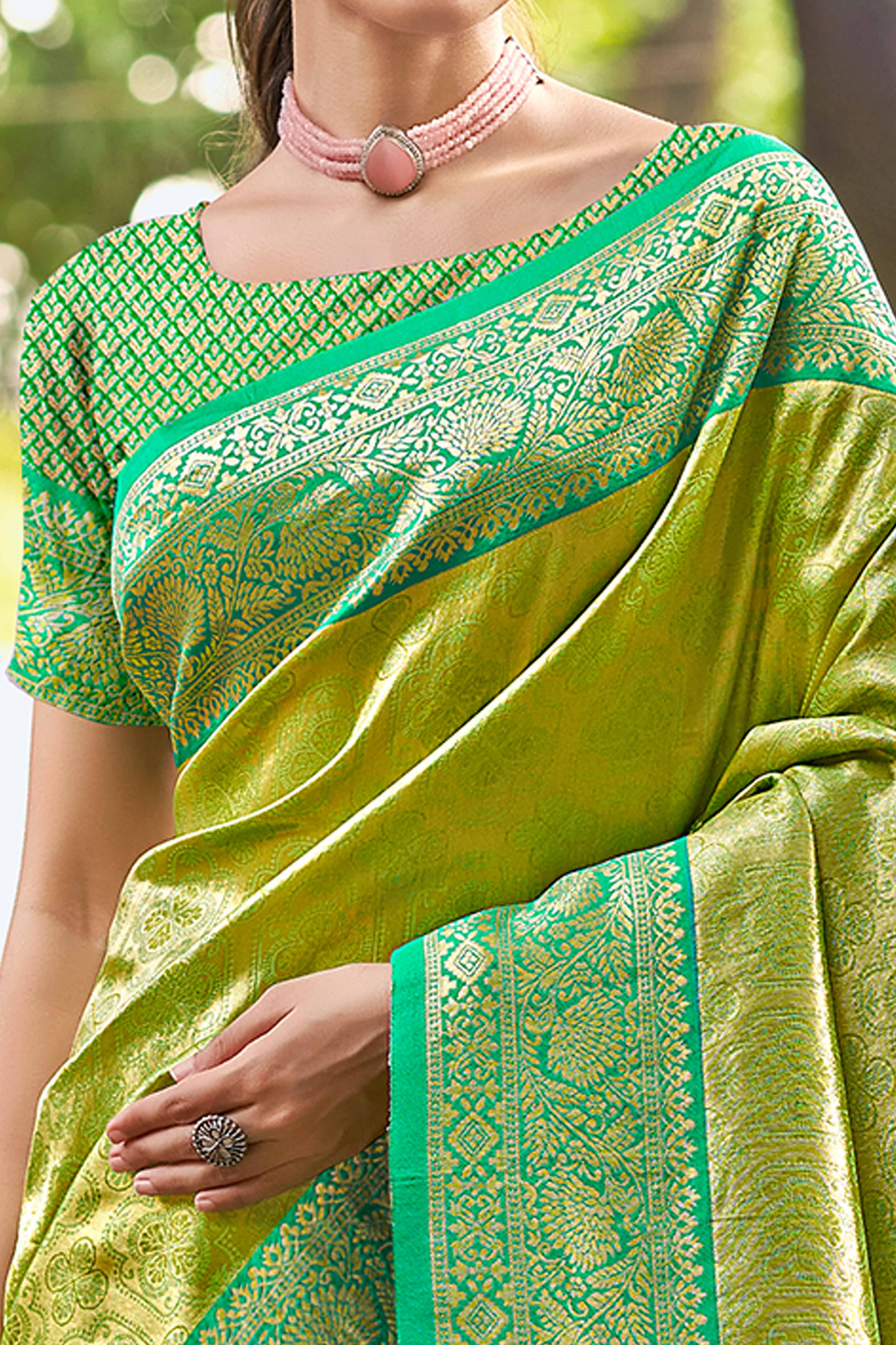 Green Paithani Saree In Kanjivaram Silk Featuring Floral Woven Motifs & Tassel Pallu