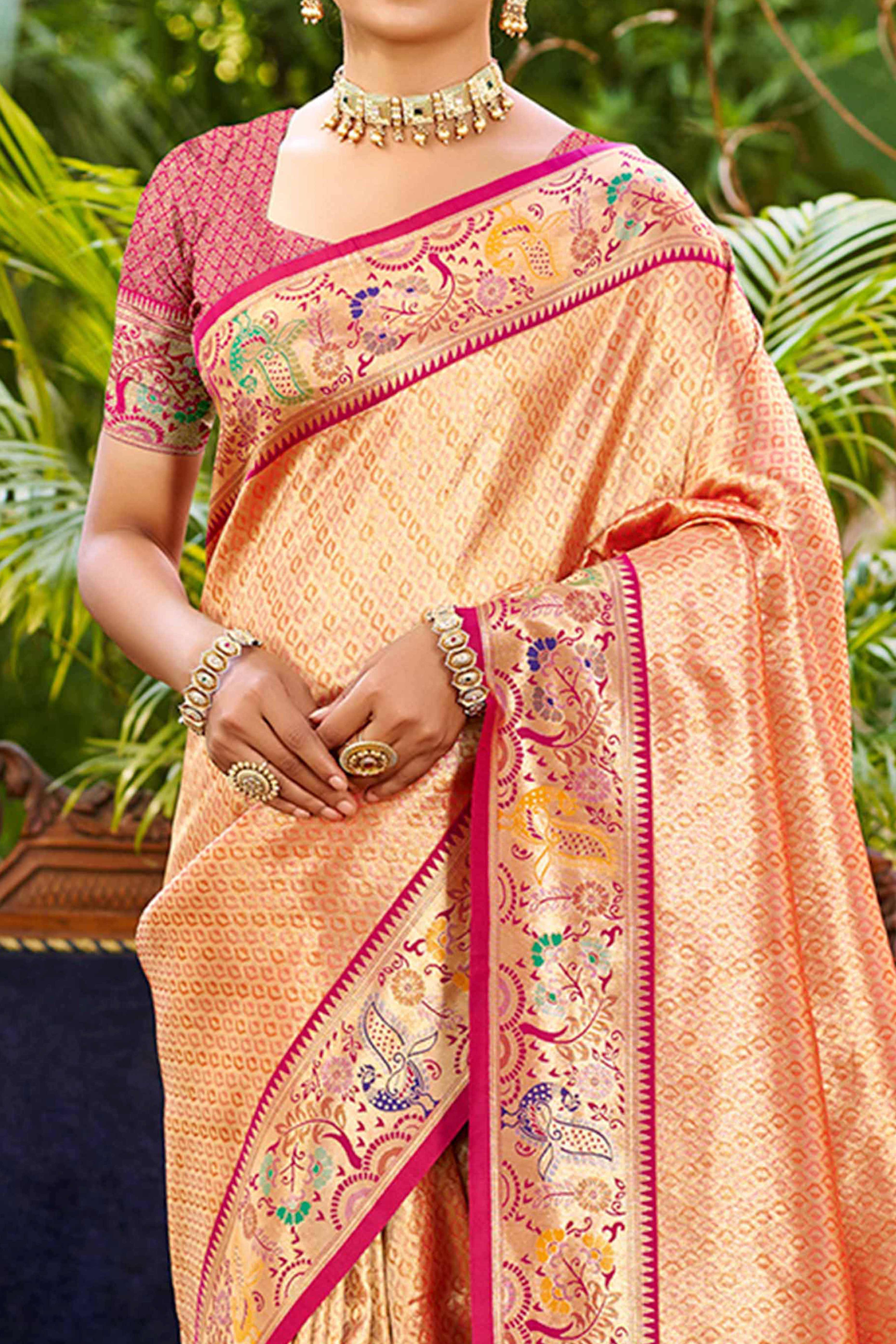 Graceful Orange Silk Blend Saree Adorned With Intricate Zari Weave & Peacock Motif Pallu
