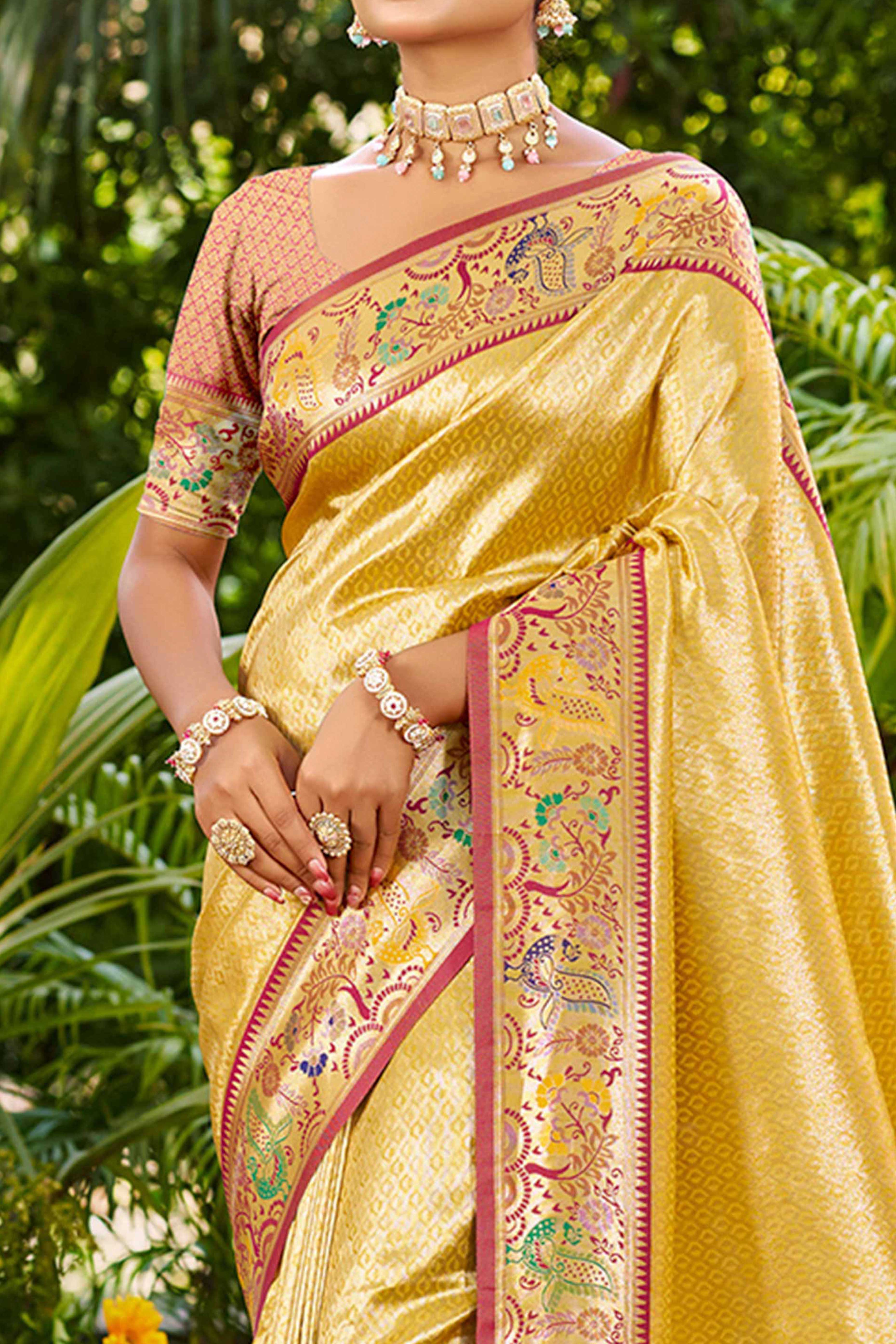 Graceful Yellow Silk Blend Saree Adorned With Intricate Zari Weave & Peacock Motif Pallu