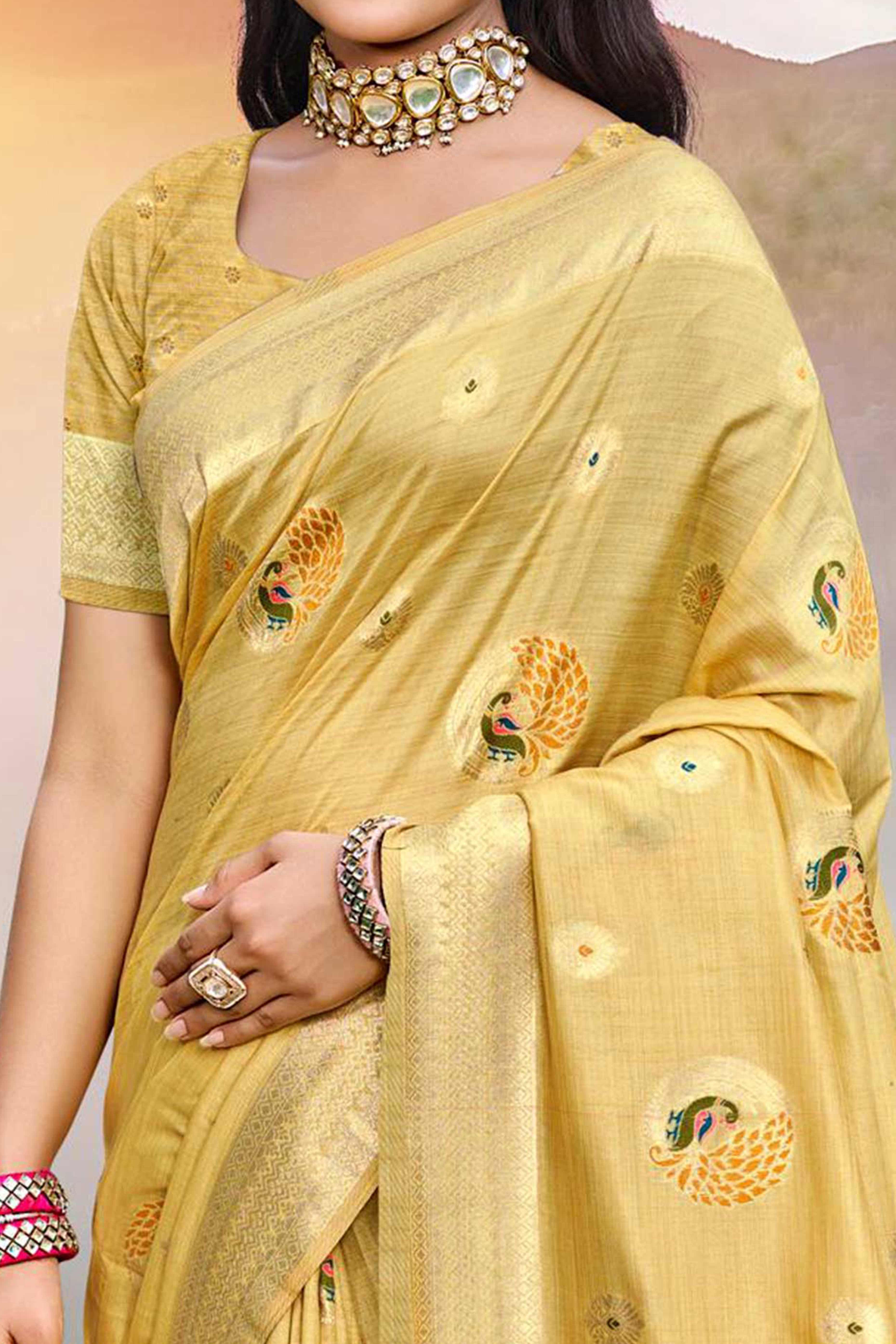 Designer Mustard Assam Silk Blend Saree Adorned With Peacock Zari Weaving & Tassel Pallu