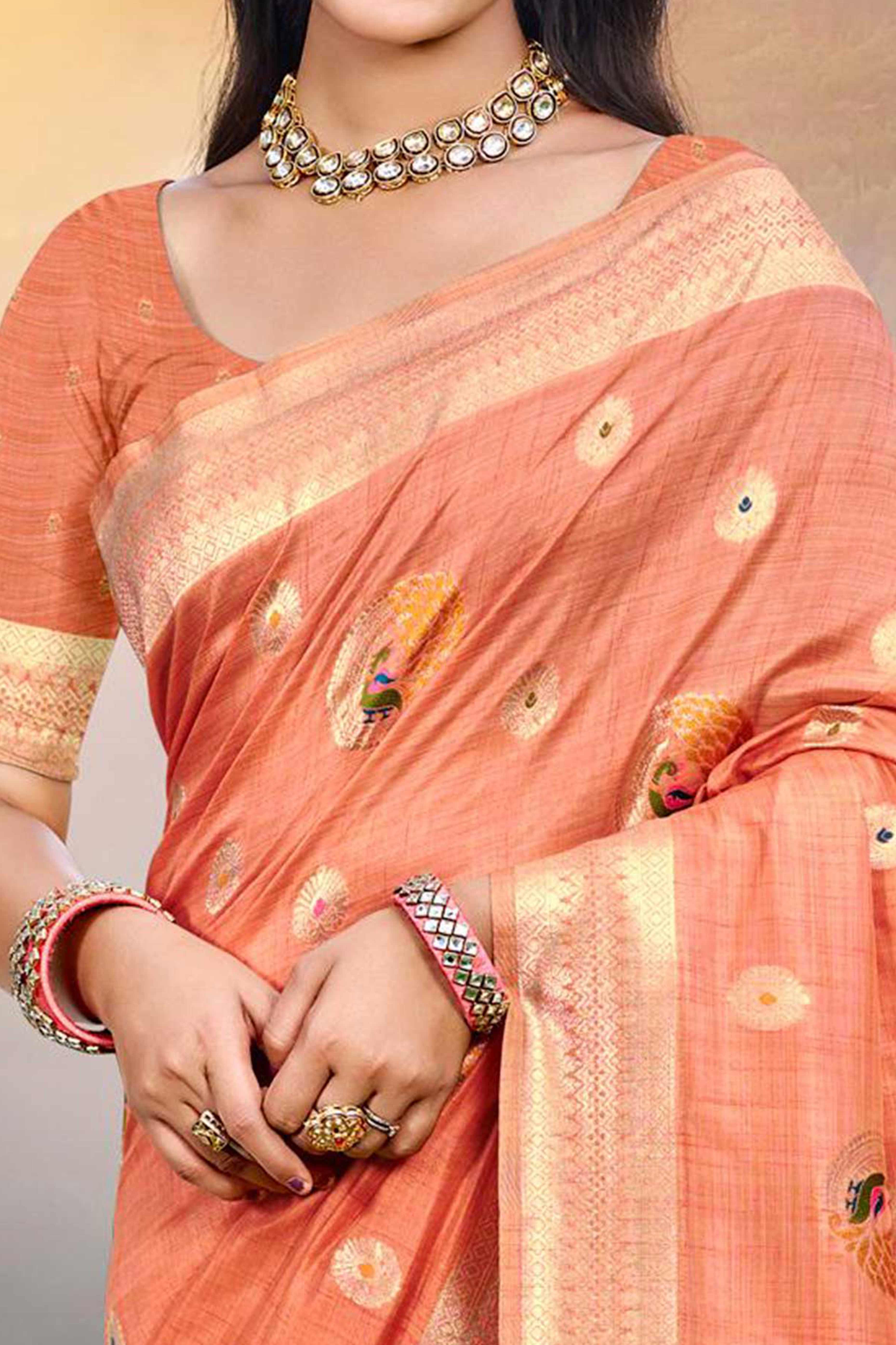 Designer Light Orange Assam Silk Blend Saree Adorned With Peacock Zari Weaving & Tassel Pallu