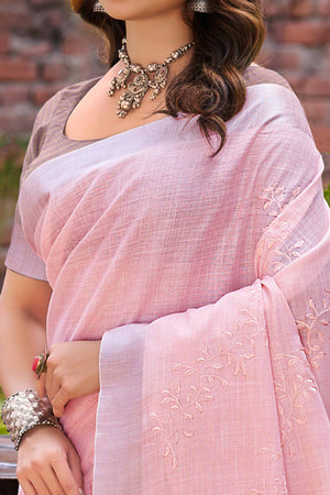 Elegant Pink Linen Saree Featuring Intricate Woven & Embroidered Patterns