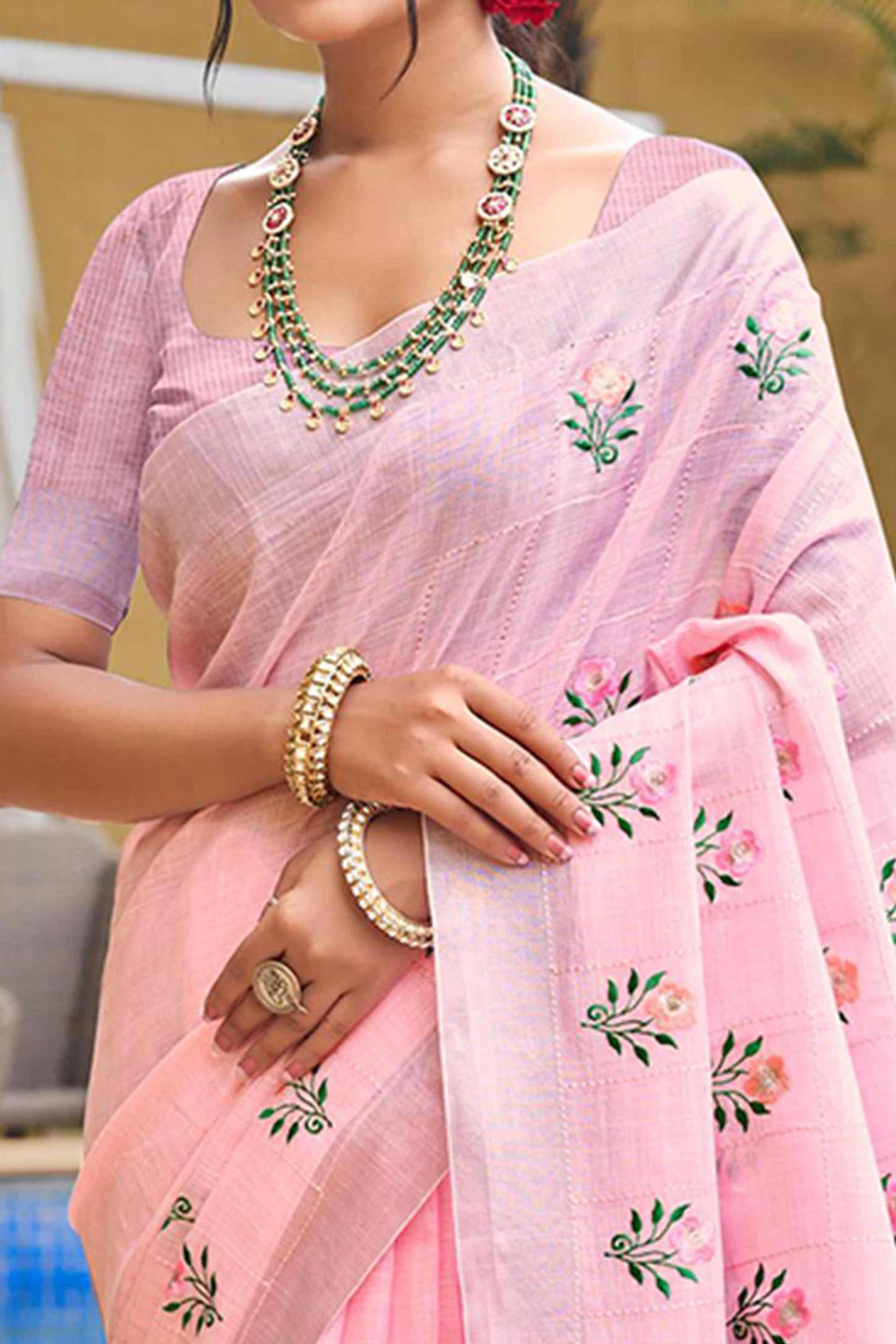 Captivating Pastel Pink Floral Thread Embroidered Linen Saree With Elegant Weaving Border