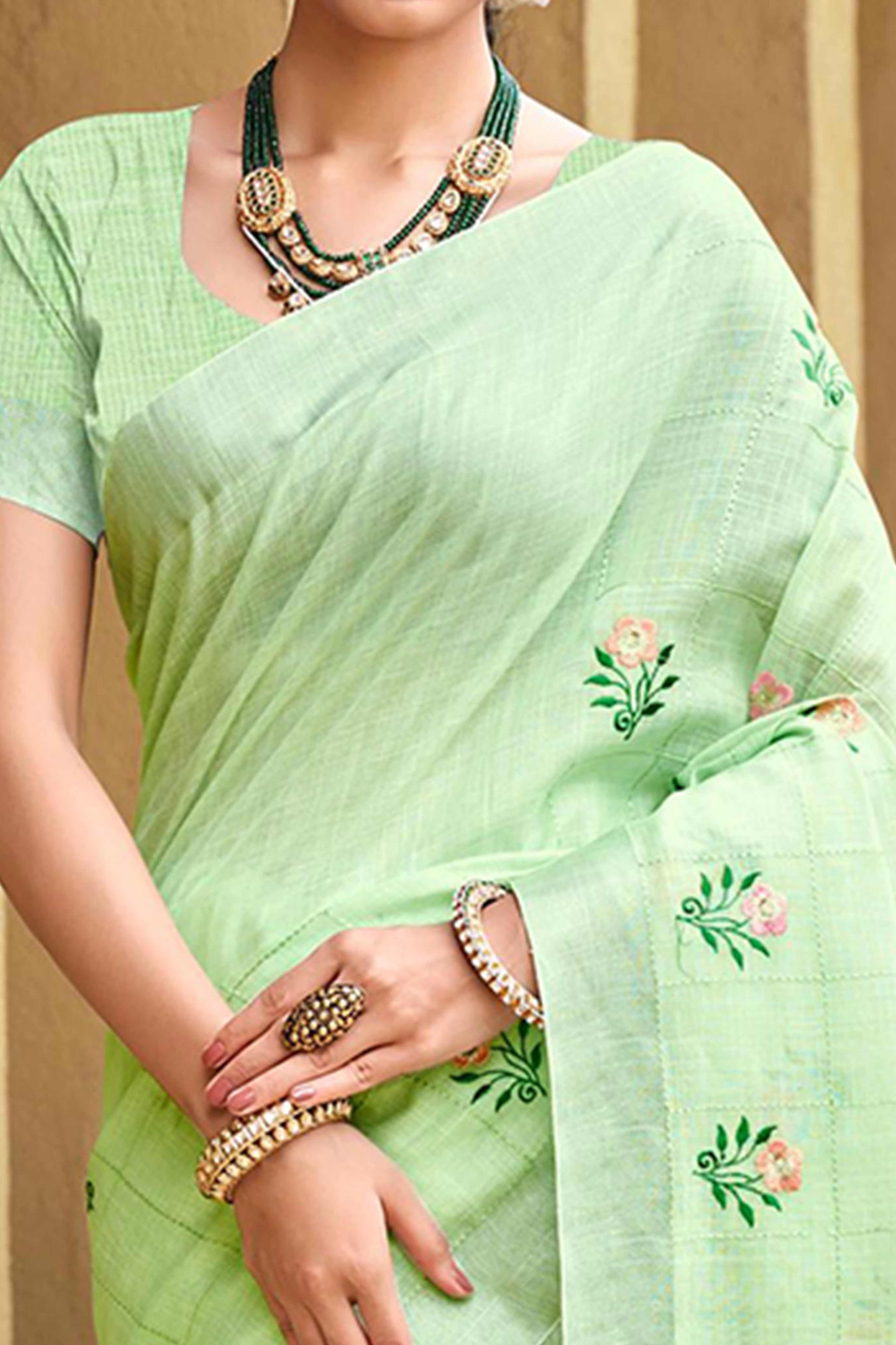 Captivating Green Floral Thread Embroidered Linen Saree With Elegant Weaving Border