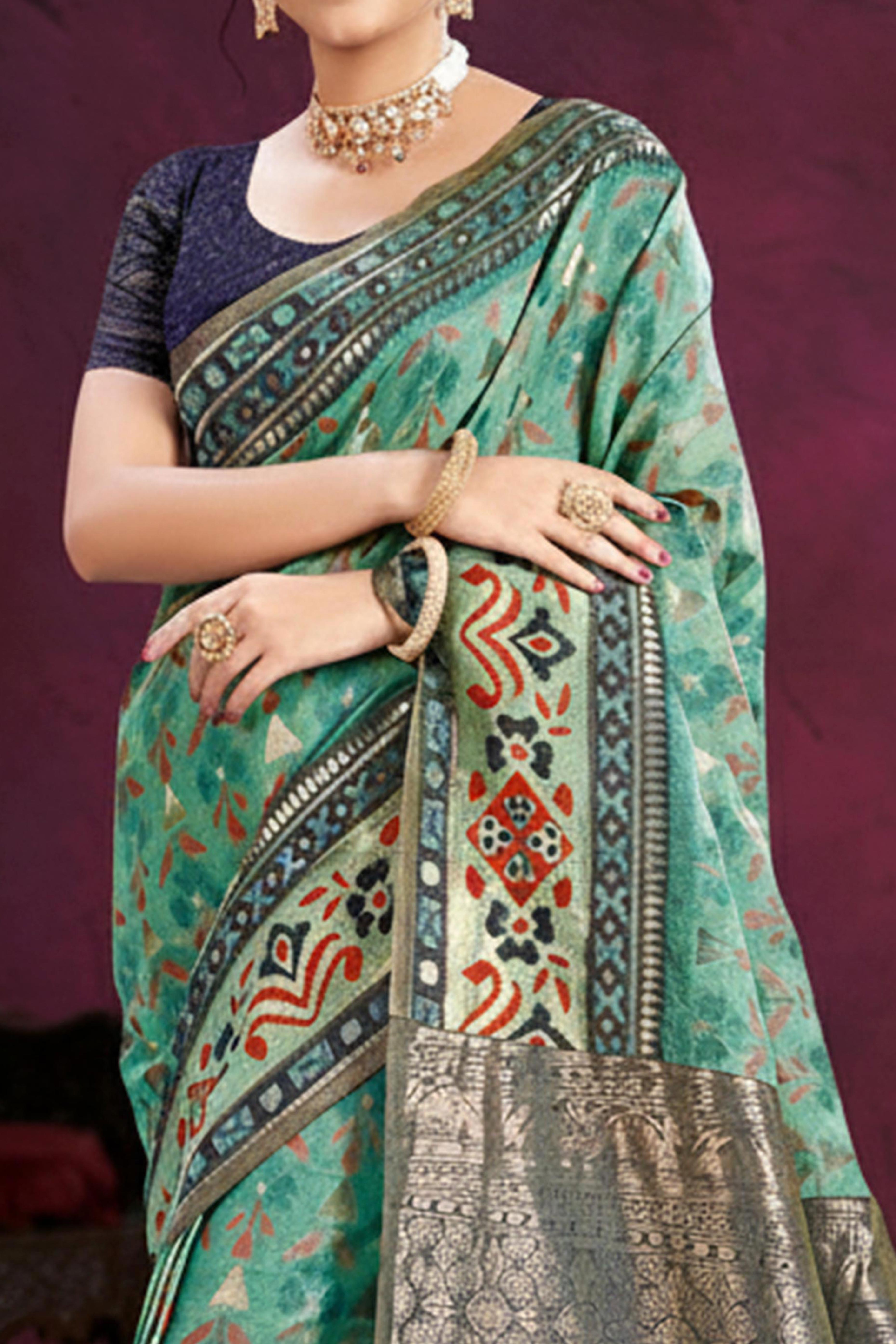 Designer Turquoise Cotton Silk Saree Showcasing Delicate Floral Weaving & Tassel Pallu