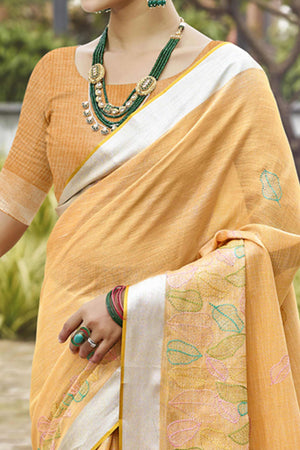 Classic Light Orange Leaf Pattern Thread Embroidery Work Linen Saree With Tassel Pallu