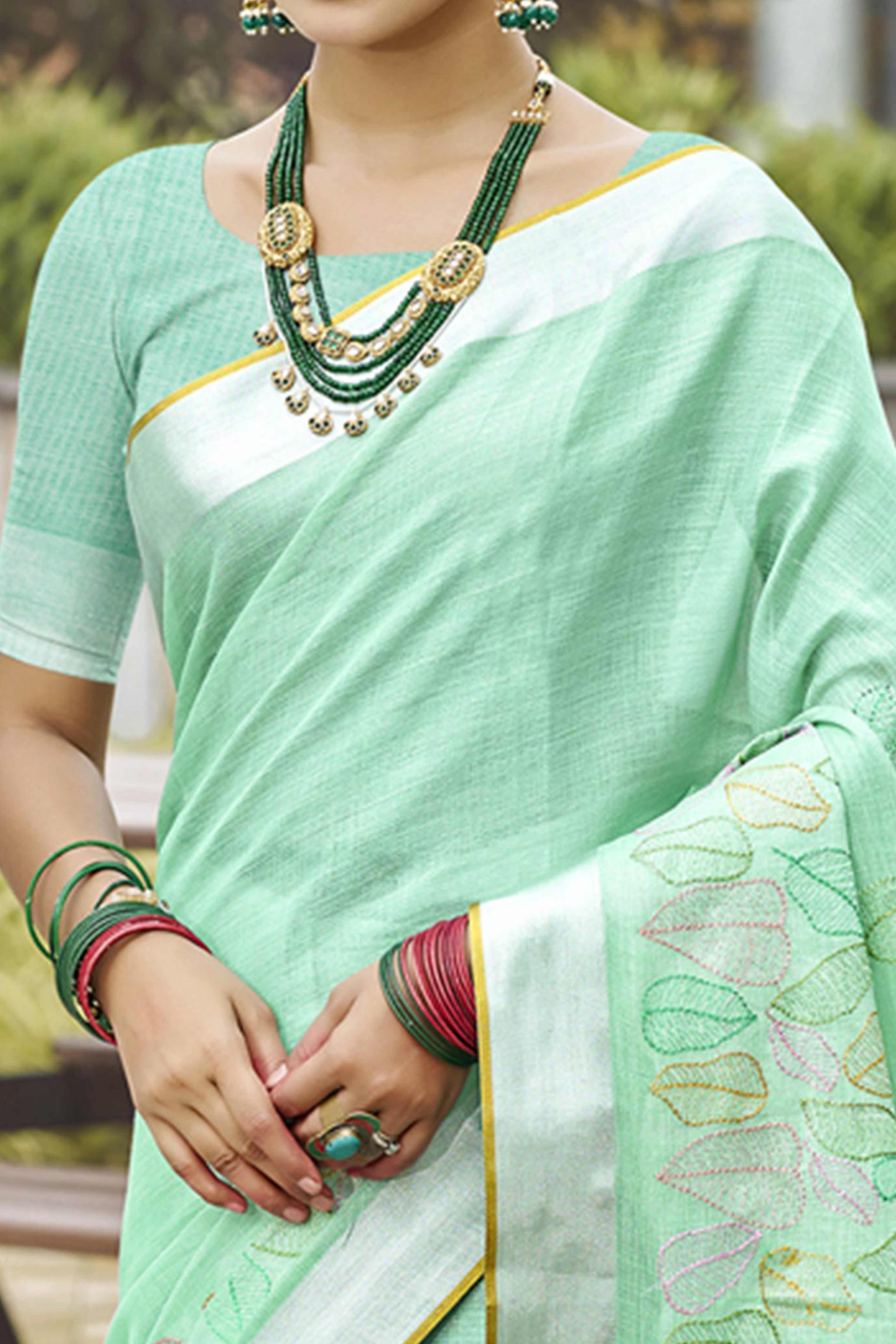 Classic Sea Green Leaf Pattern Thread Embroidery Work Linen Saree With Tassel Pallu