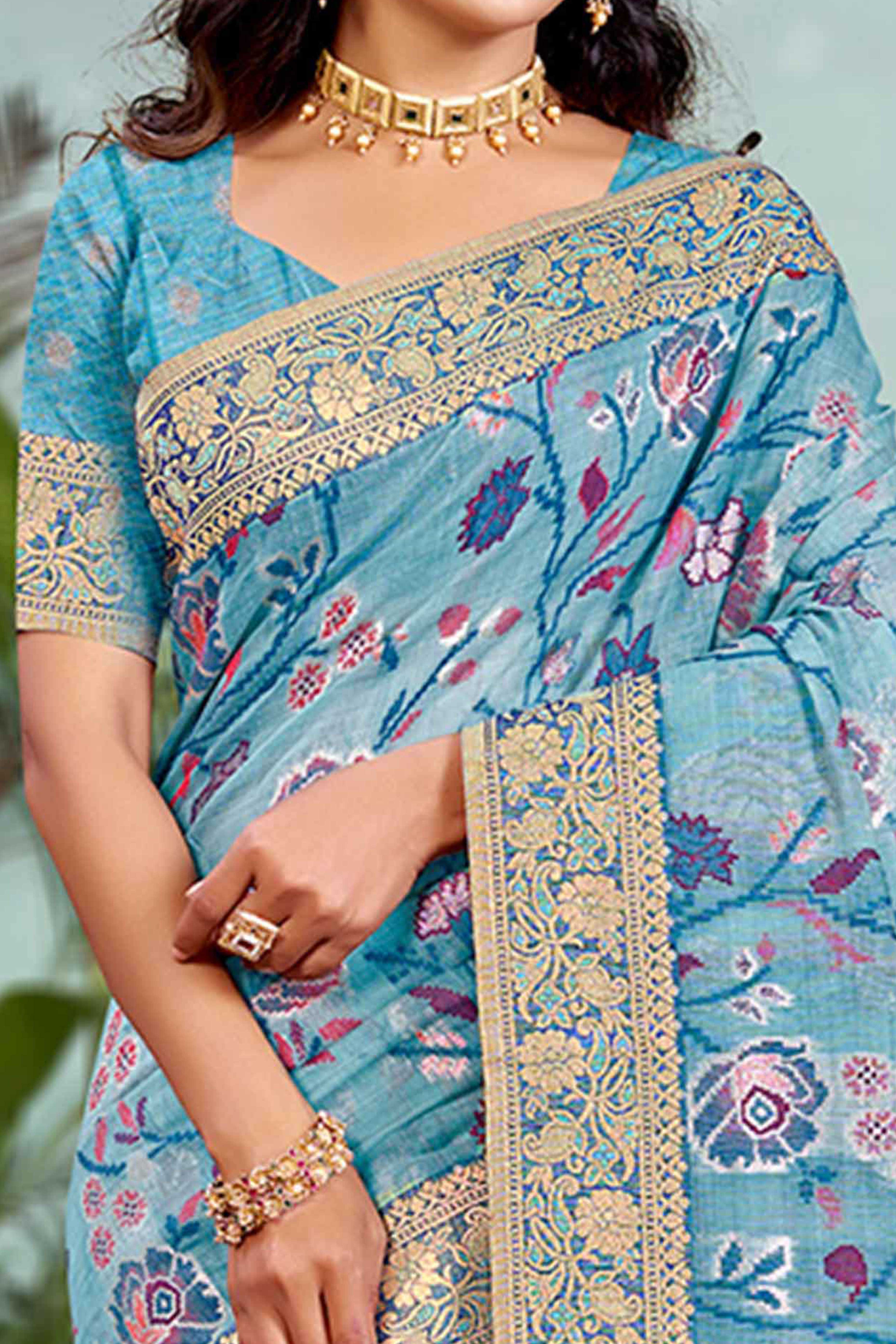 Captivating Blue Floral Zari Weaving Cotton Silk Saree Accented With Tassel Pallu