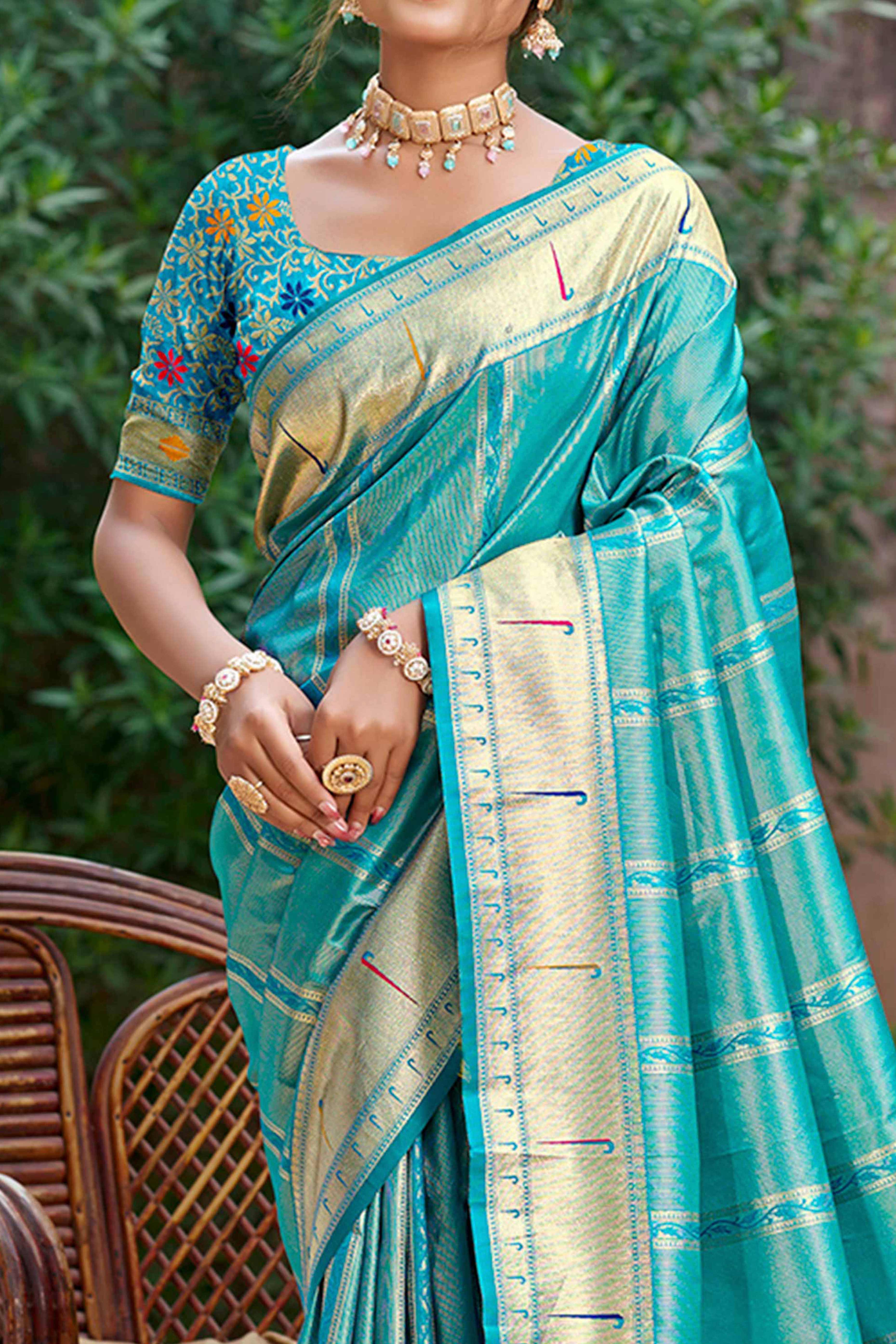 Turquoise Blue Designer Weaving Silk Blend Saree Accented With Graceful Peacock & Floral Motif Pallu