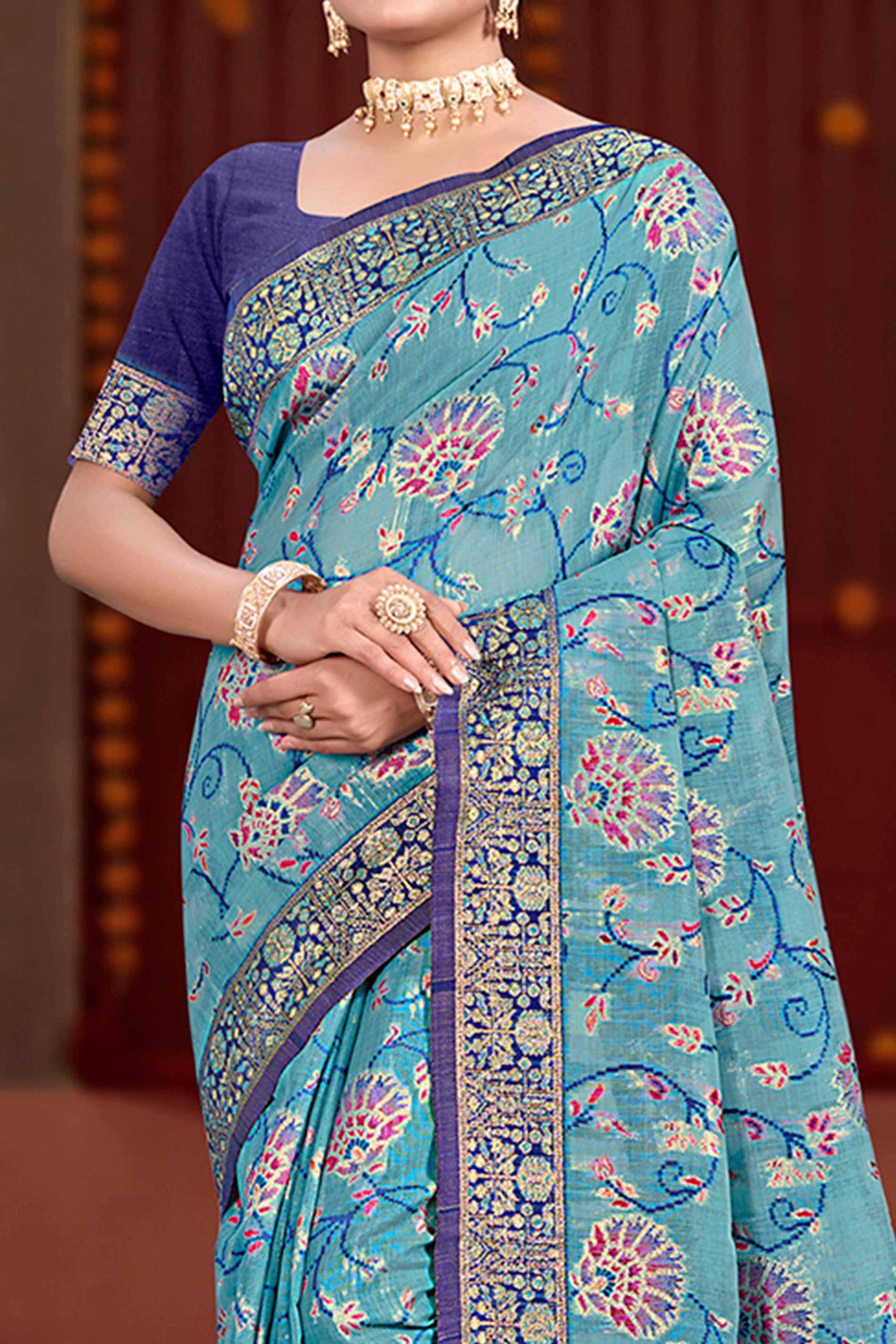 Elegant Blue Cotton Silk Saree Adorned With Floral Weaving & Graceful Tassel Pallu
