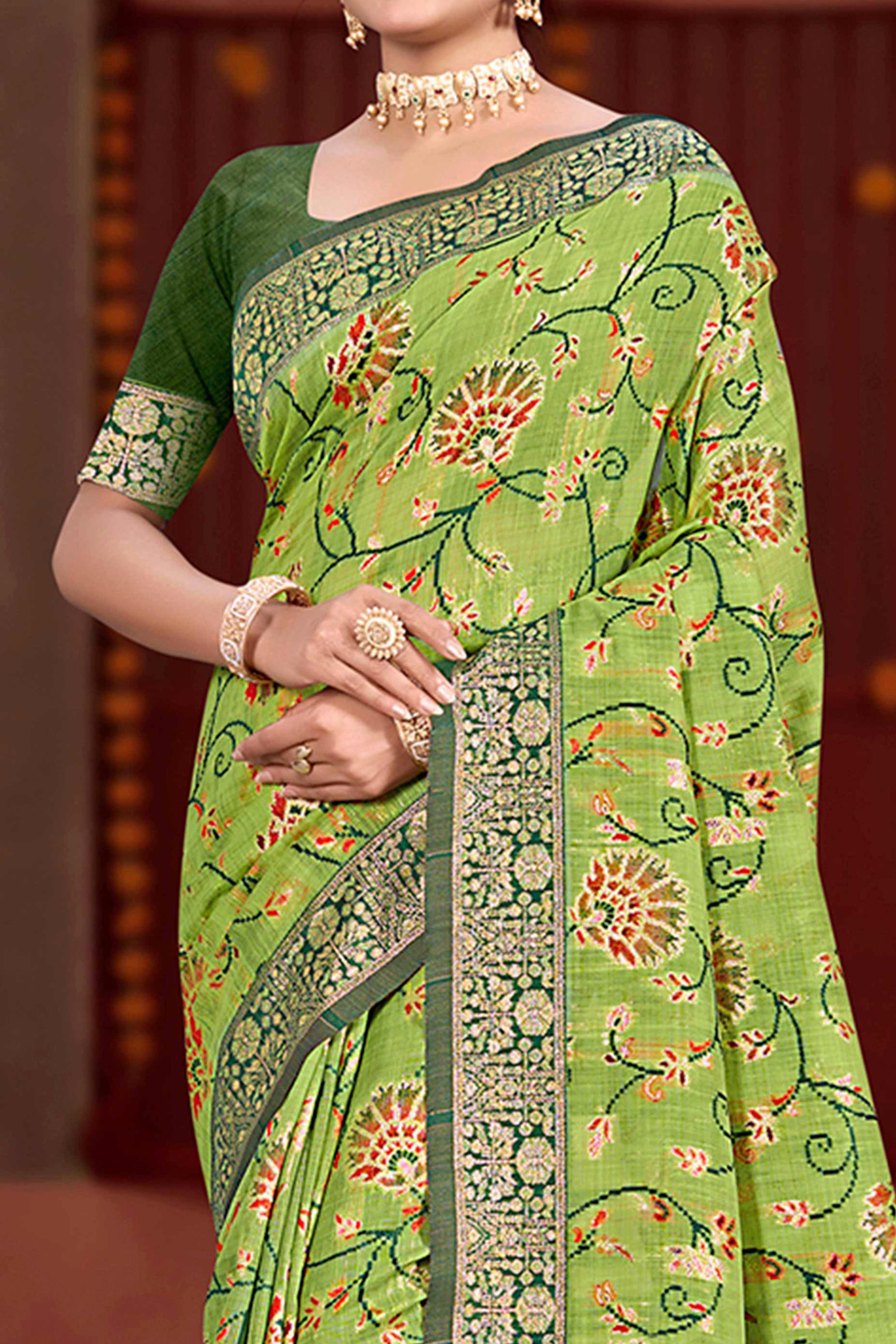 Elegant Green Cotton Silk Saree Adorned With Floral Weaving & Graceful Tassel Pallu