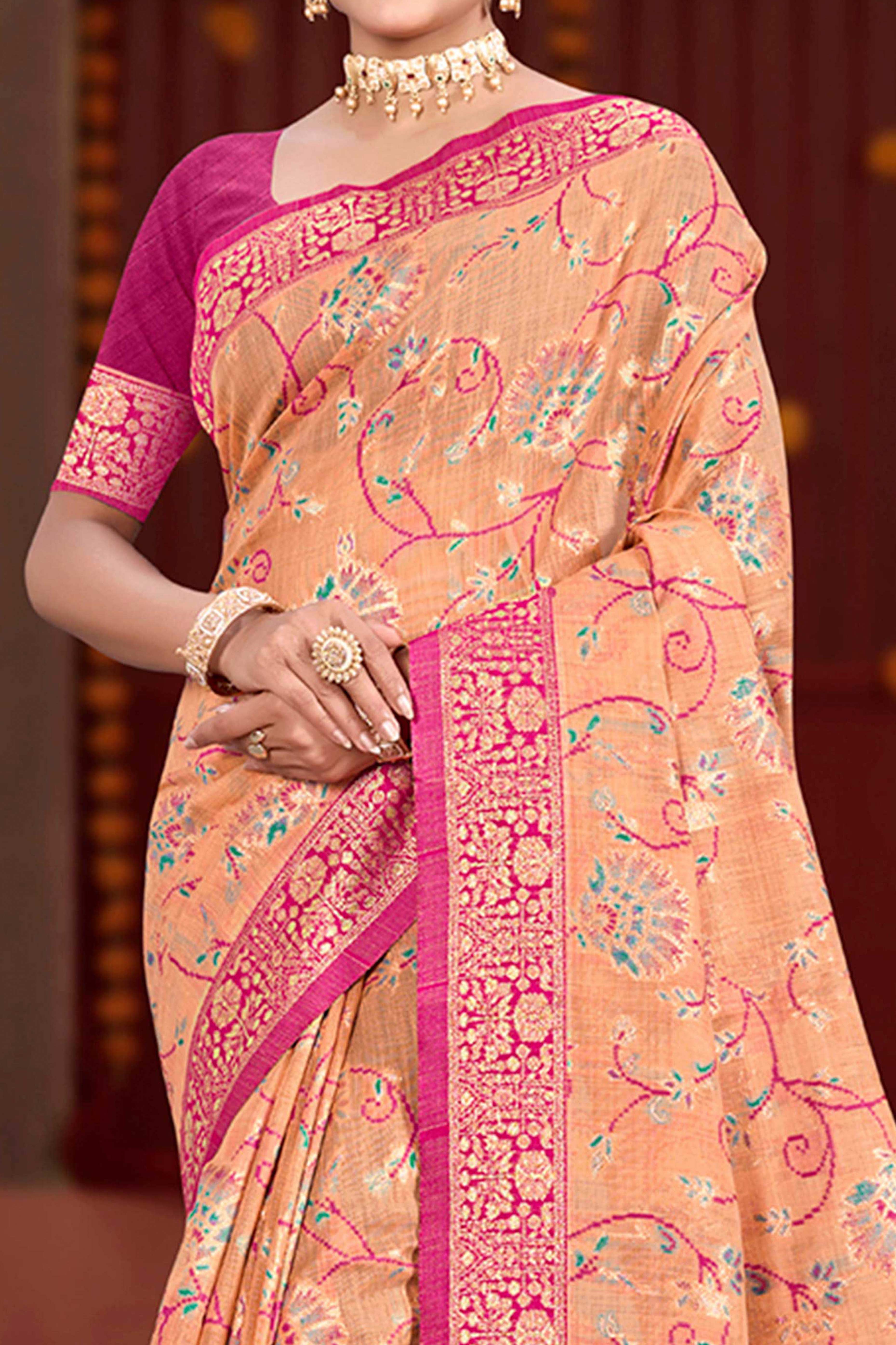 Elegant Light Orange Cotton Silk Saree Adorned With Floral Weaving & Graceful Tassel Pallu