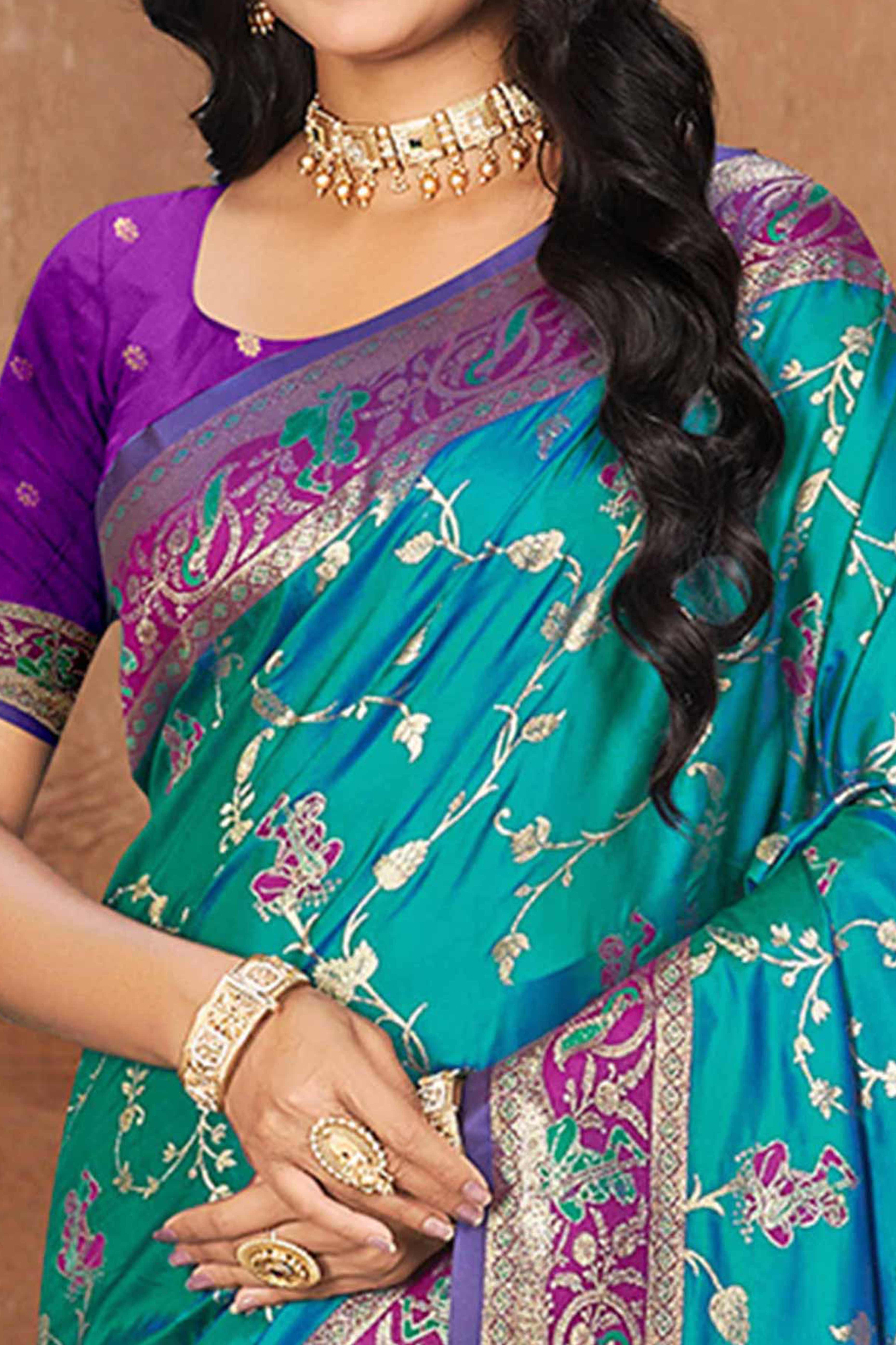 Radiant Rama Blue Floral Zari Weaving Silk Blend Saree With Tassel Pallu