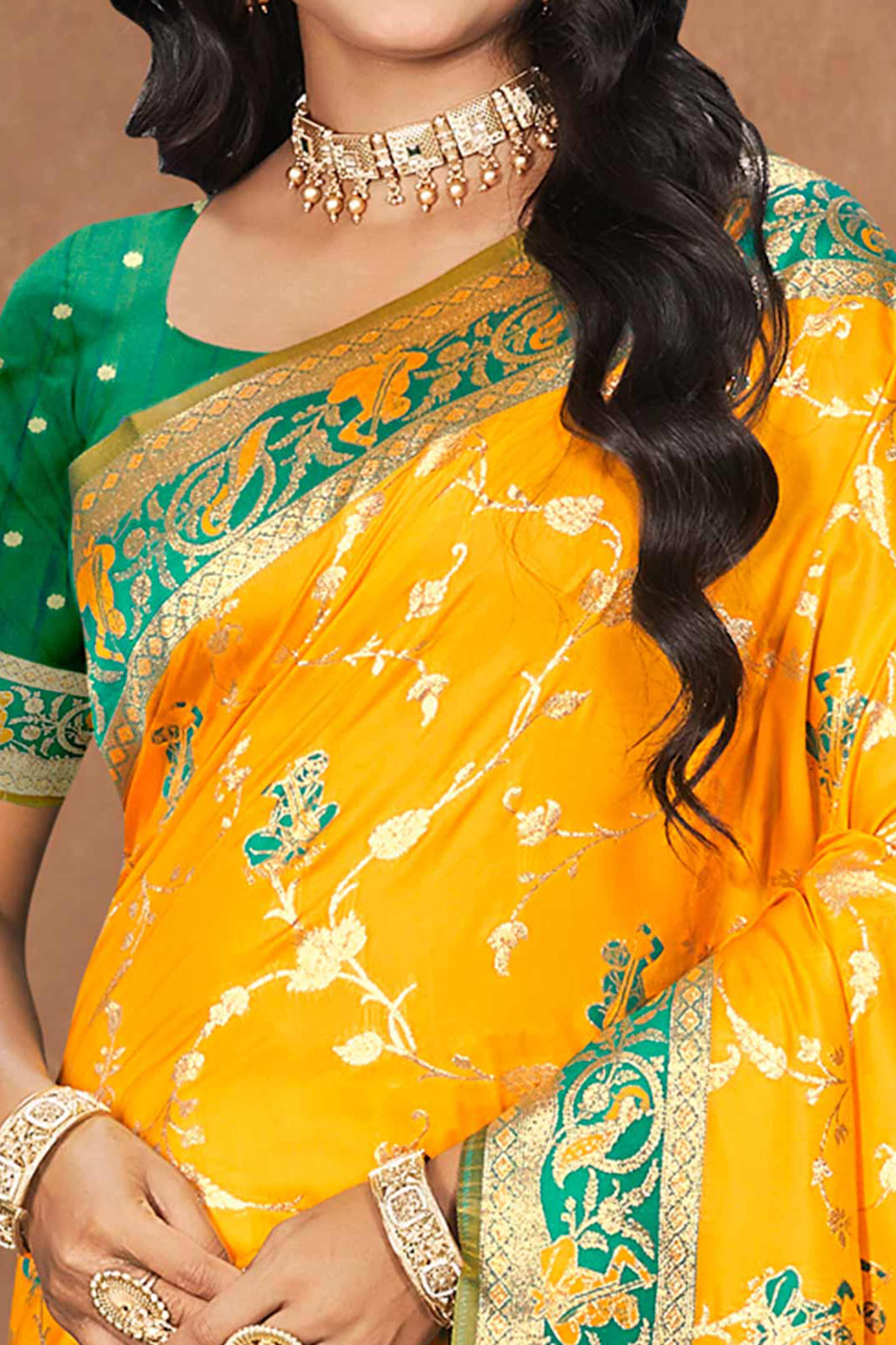 Radiant Yellow Floral Zari Weaving Silk Blend Saree With Tassel Pallu
