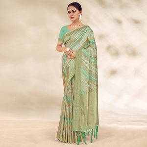 Pista Green Woven Cotton Silk Saree With Tassels
