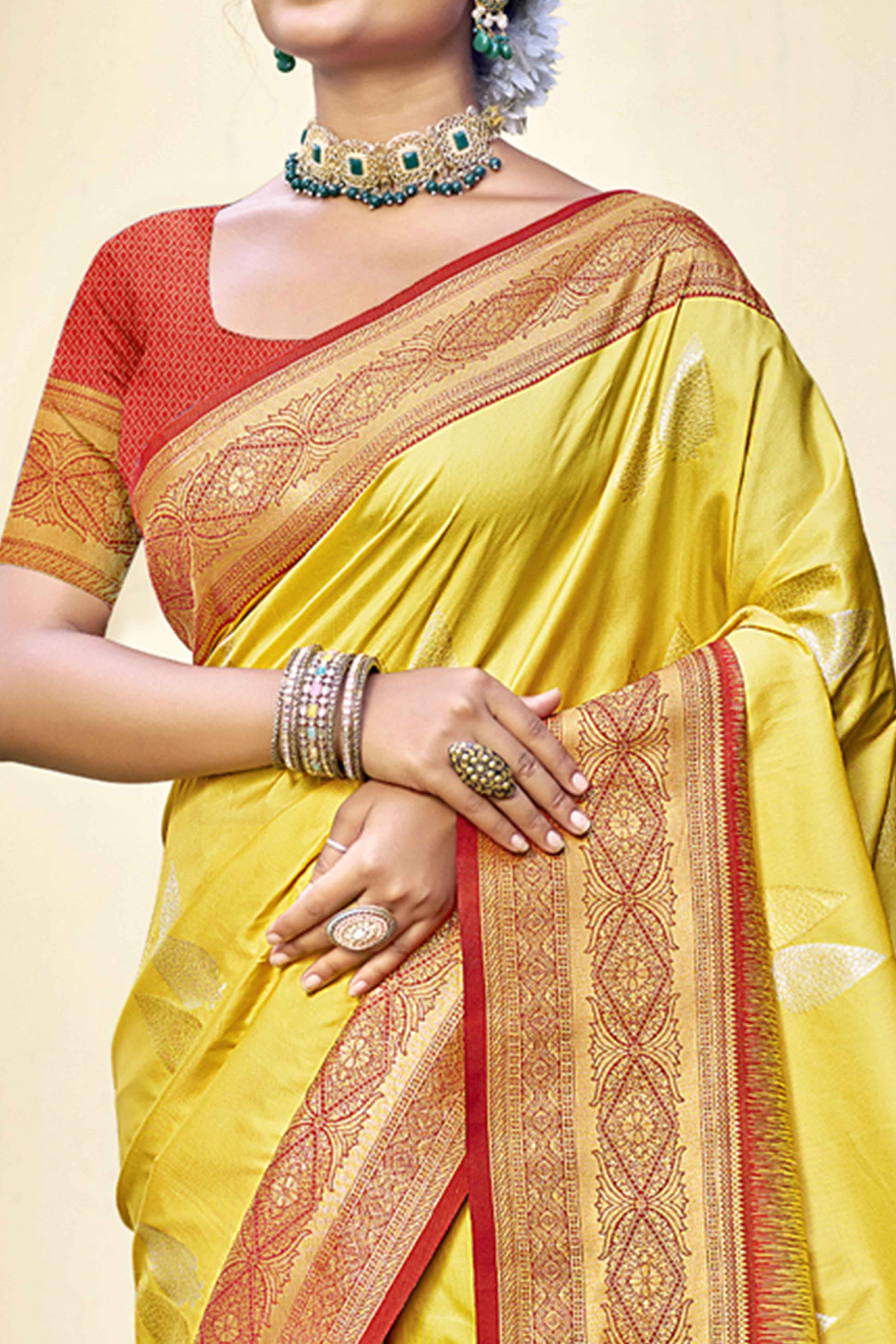 Yellow Woven Banarasi Silk Saree With Tassels