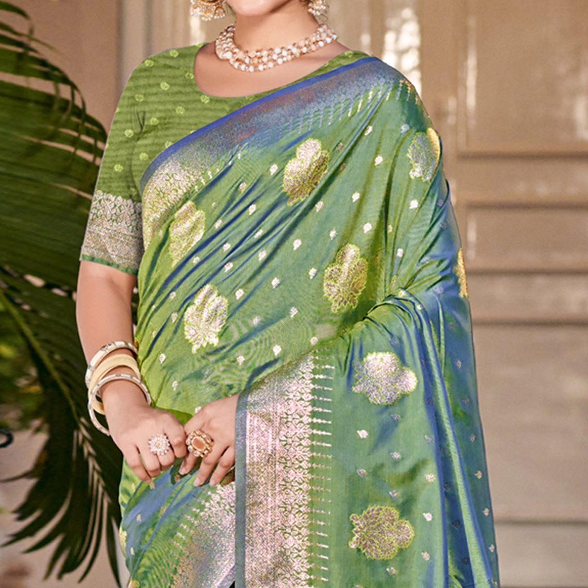 Green Floral Woven Banarasi Silk Saree With Tassels