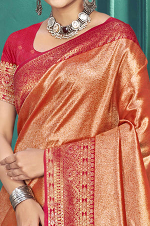 Exclusive Peach Floral Motif Woven Kanjivaram Silk Saree With Graceful Tassel Pallu