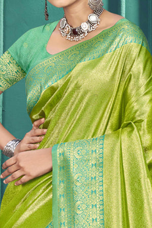 Exclusive Parrot Green Floral Motif Woven Kanjivaram Silk Saree With Graceful Tassel Pallu