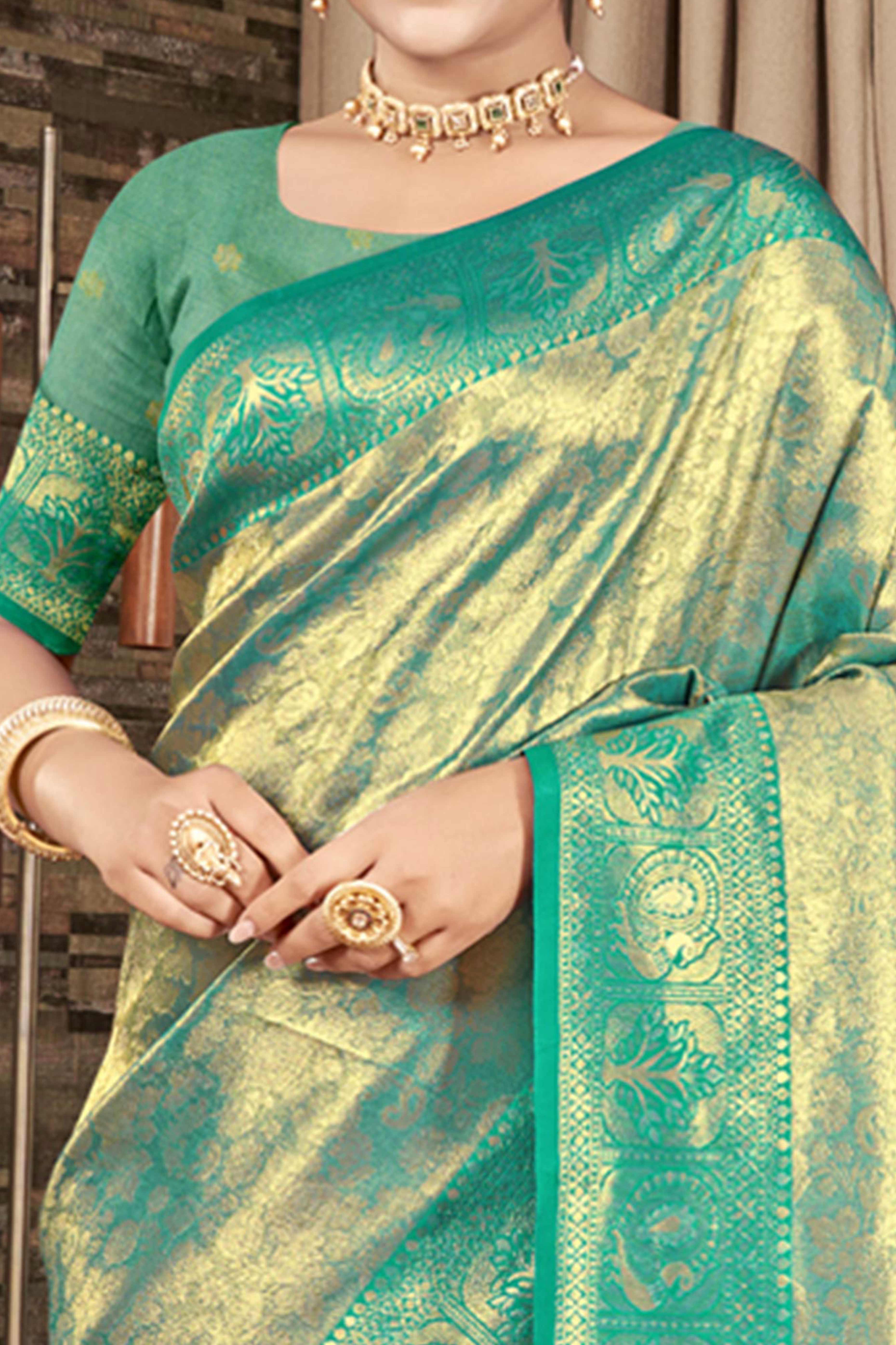 Premium Rama Green Floral and Peacock Motif Woven Kanjivaram Silk Saree With Tassel Pallu