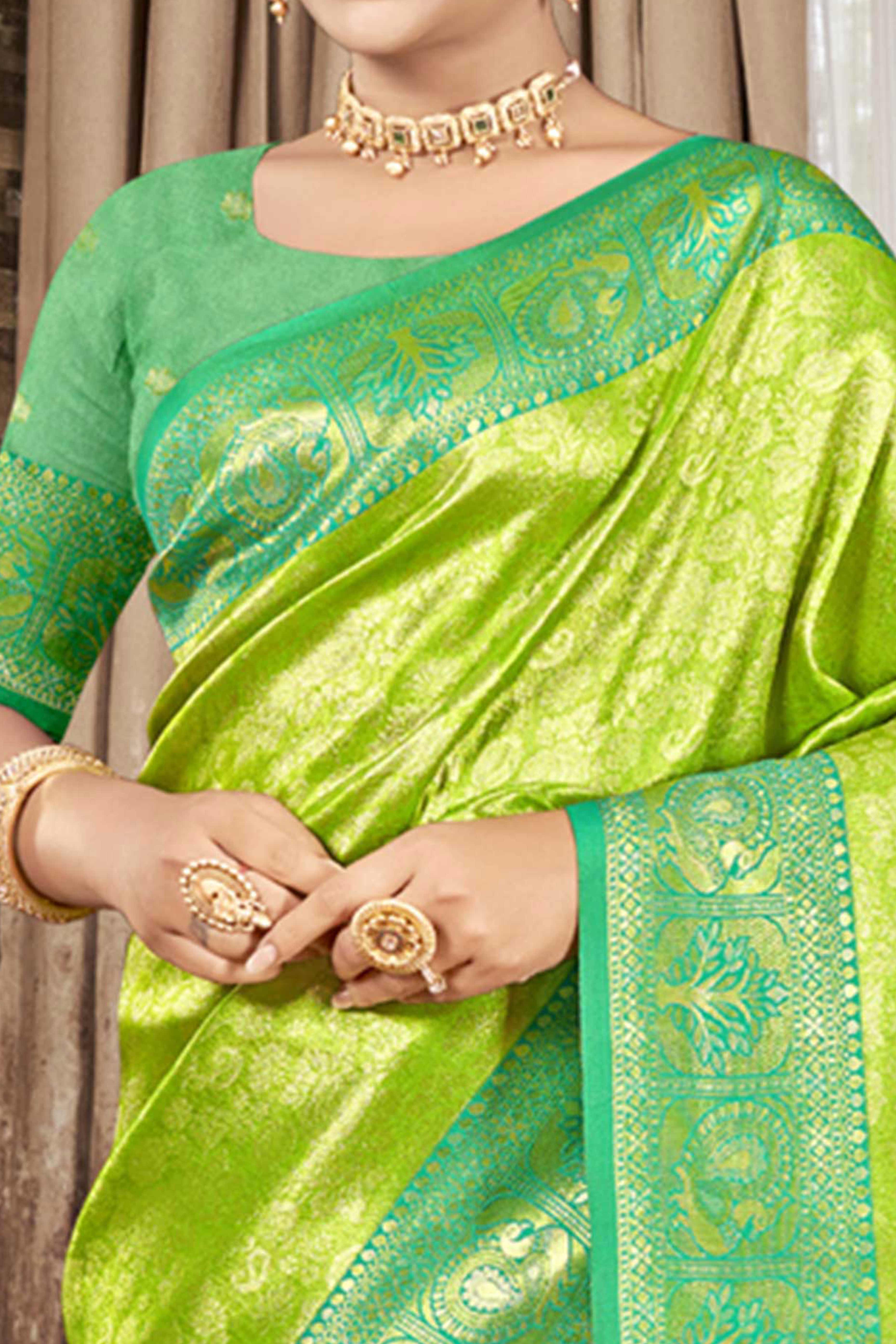 Premium Green Floral and Peacock Motif Woven Kanjivaram Silk Saree With Tassel Pallu