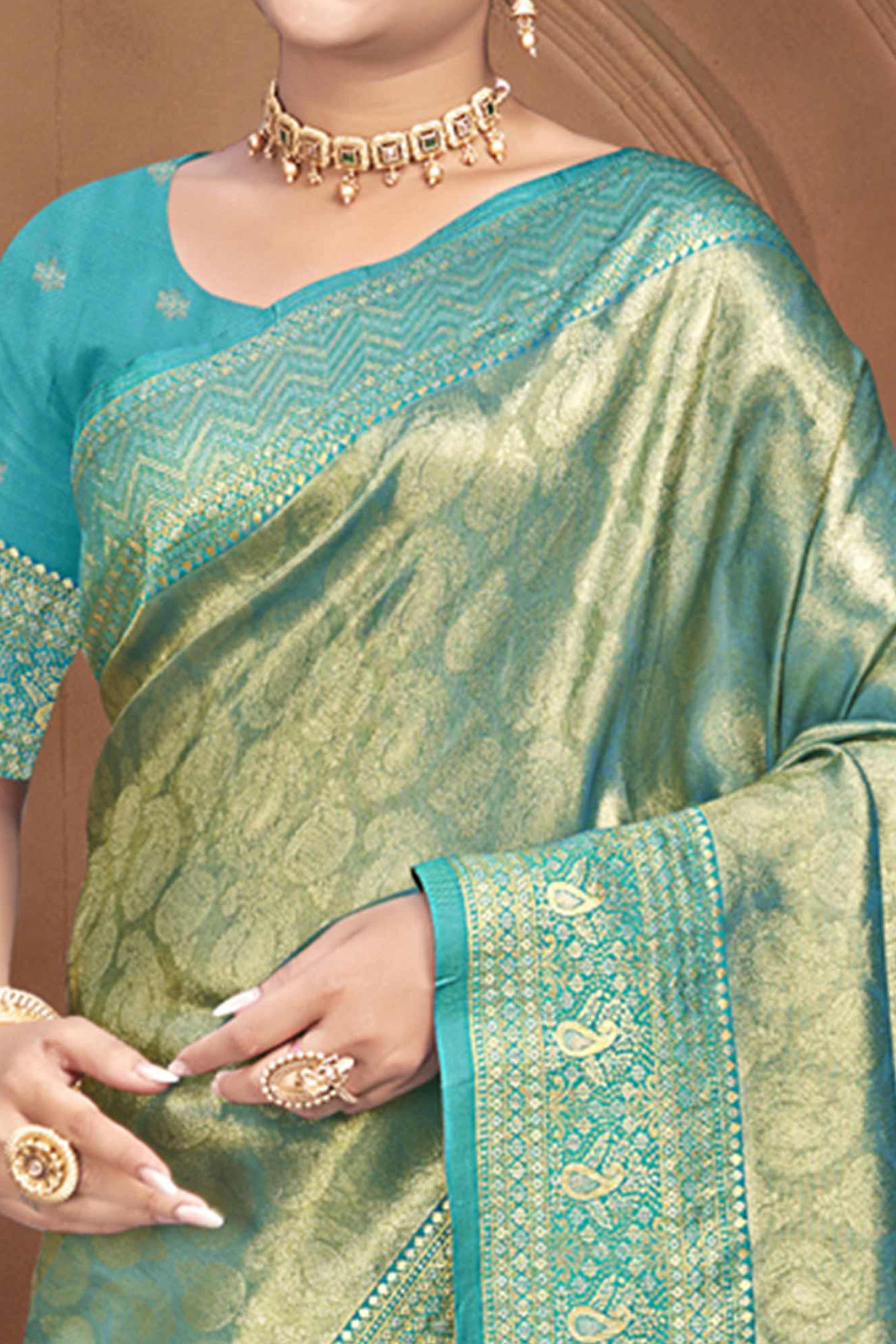 Exclusive Turquoise Paisley & Floral Pattern Weaving Kanjivaram Silk Saree With Tassel Pallu