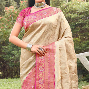 Cream Woven Banarasi Silk Saree With Tassels