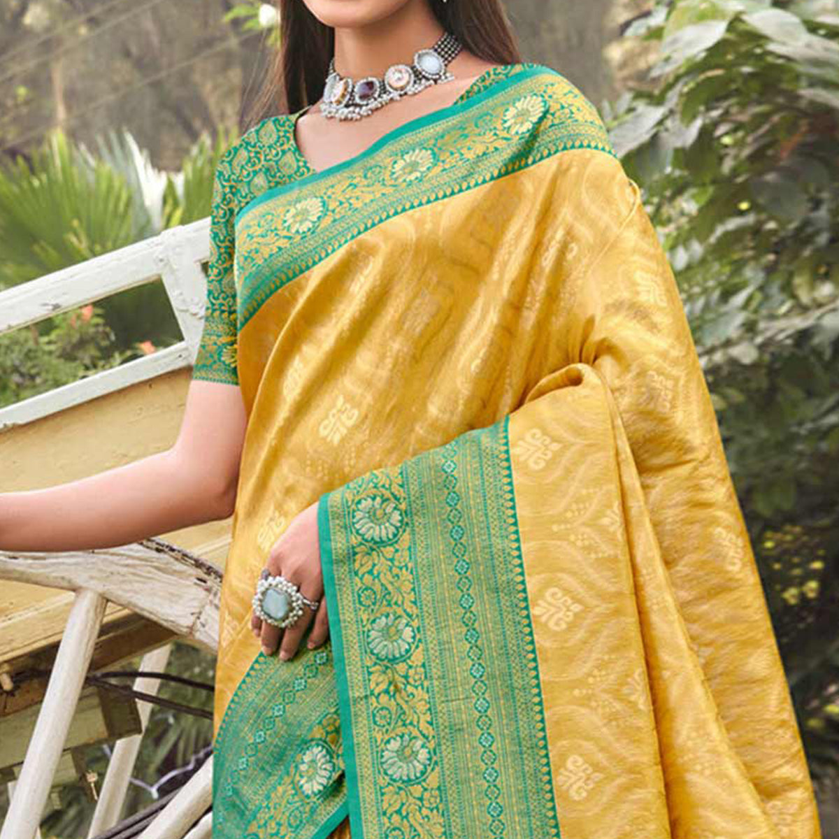 Yellow Woven Banarasi Silk Saree With Tassels