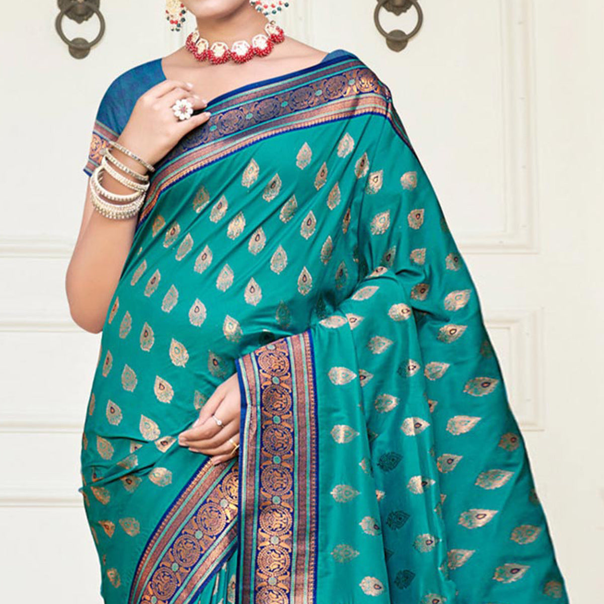 Rama Blue Woven Banarasi Silk Saree With Tassels