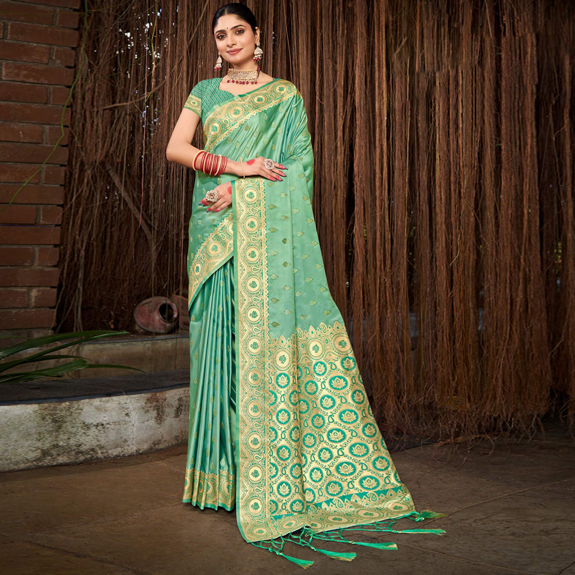 Sea Green Woven Satin Silk Saree With Tassels