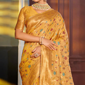 Mustard Floral Woven Banarasi Silk Saree With Tassels