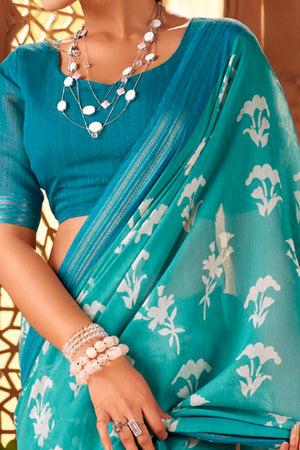 Sophisticated Turquoise Mulmul Cotton Saree Featuring Delicate Floral Prints & Weaving Border