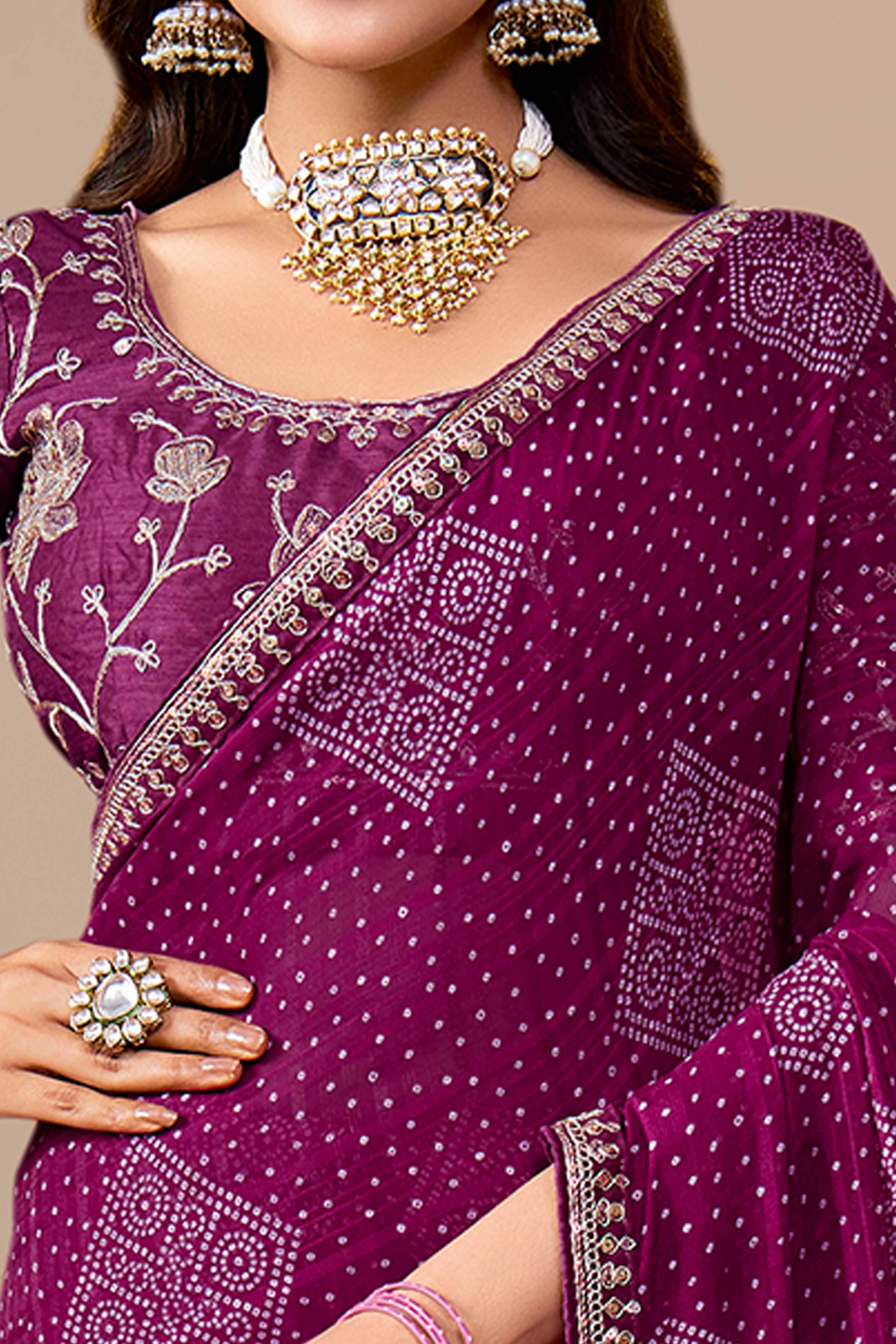 Wine Bandhani Printed Georgette Saree Enhanced With Sequins & Cording Embroidered Lace Border