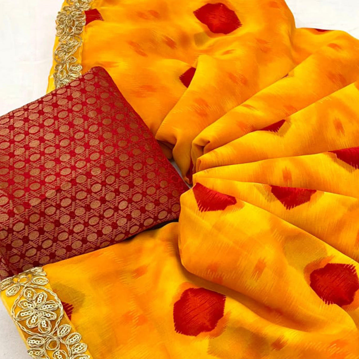 Orange Bandhani Printed Georgette Saree With Sequins Border