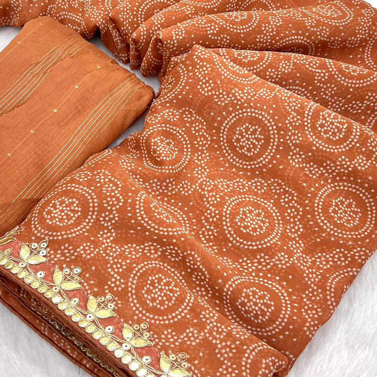 Rust Bandhani Printed Chiffon Saree With Sequins Embroidered Border