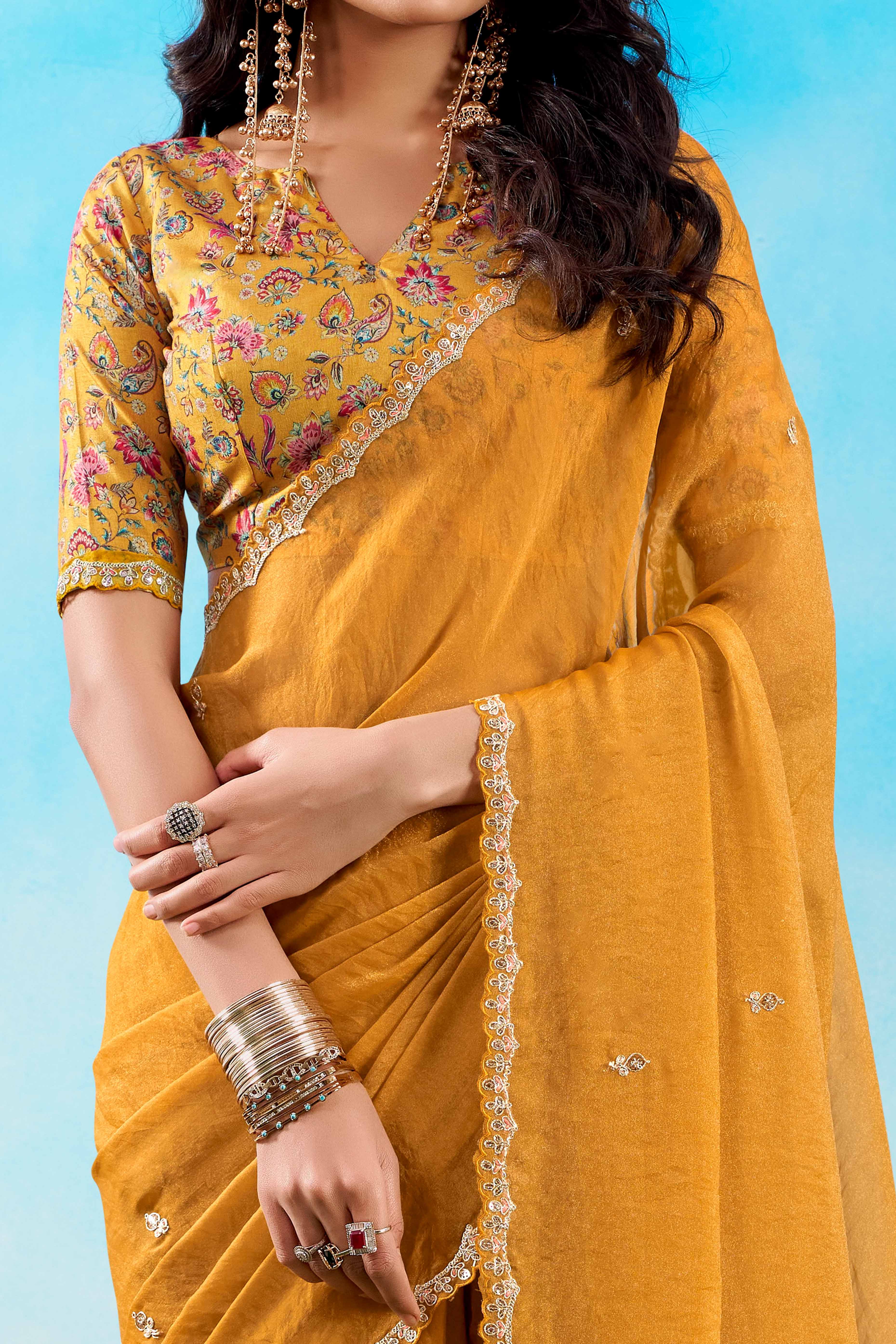 Luxurious Mustard Chiffon Saree Showcasing Floral Sequins Embroidery In A Two Tone Finish