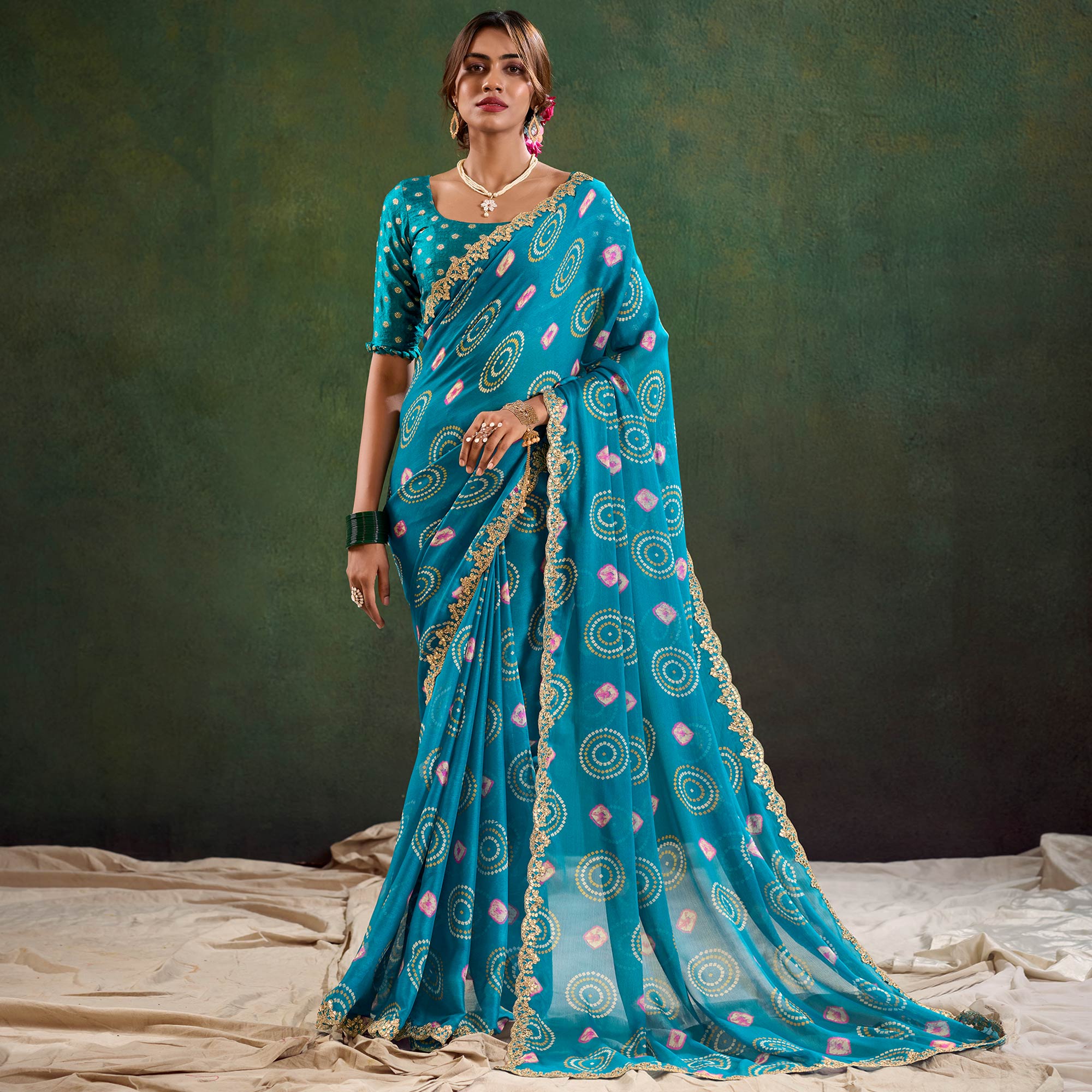 Teal Printed Chiffon Saree With Sequins Border