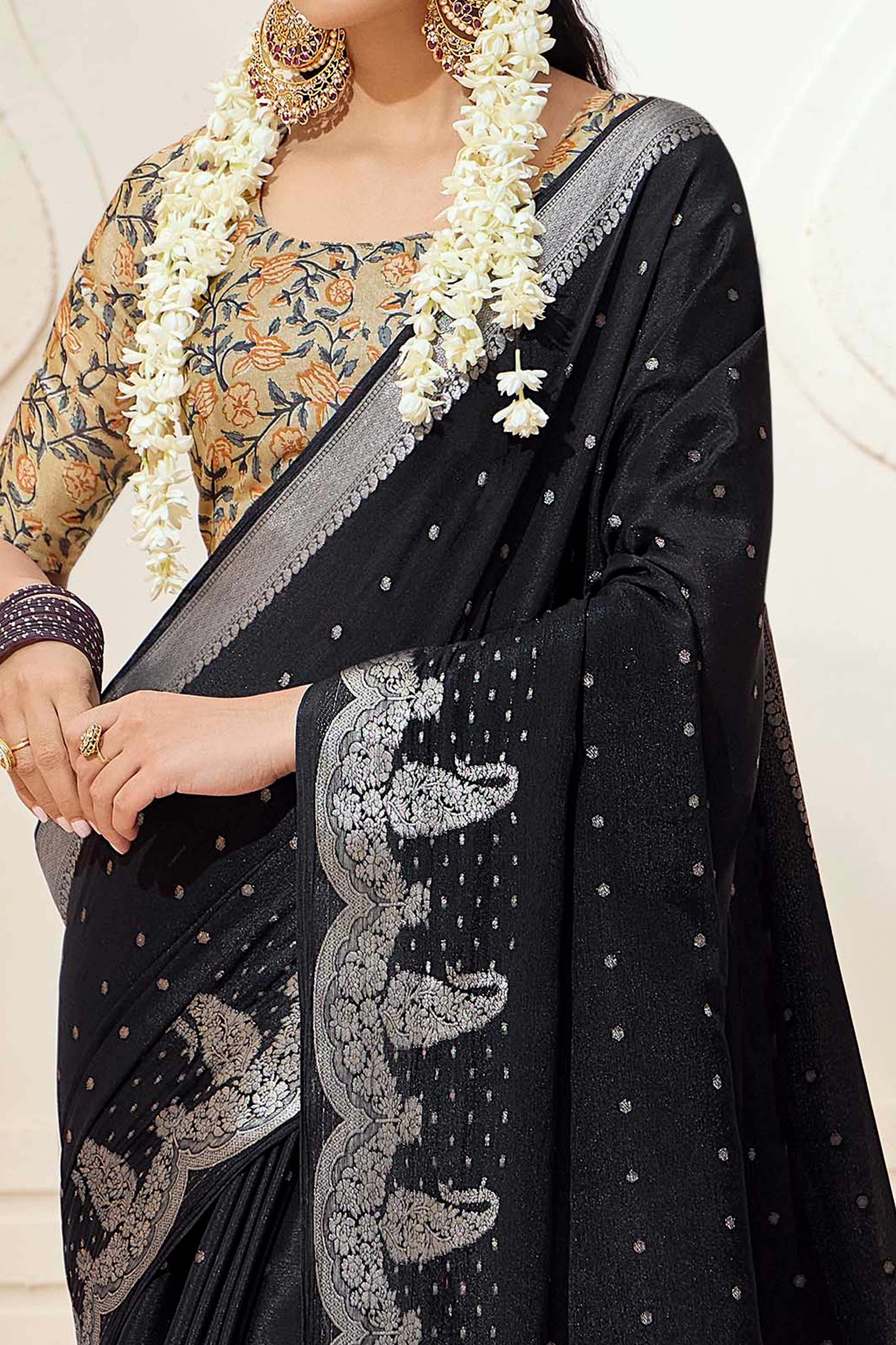 Black Chinon Saree with Jacquard Weaving and Delicate Tassel Accents