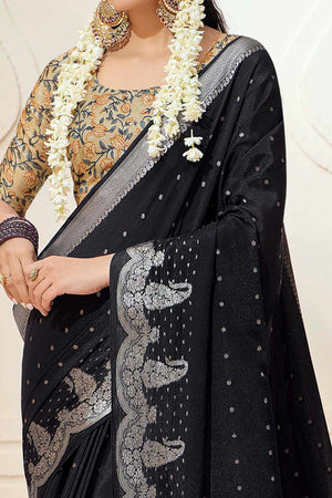 Black Chinon Saree with Jacquard Weaving and Delicate Tassel Accents