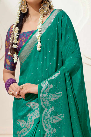 Rama Green Chinon Saree with Jacquard Weaving and Delicate Tassel Accents