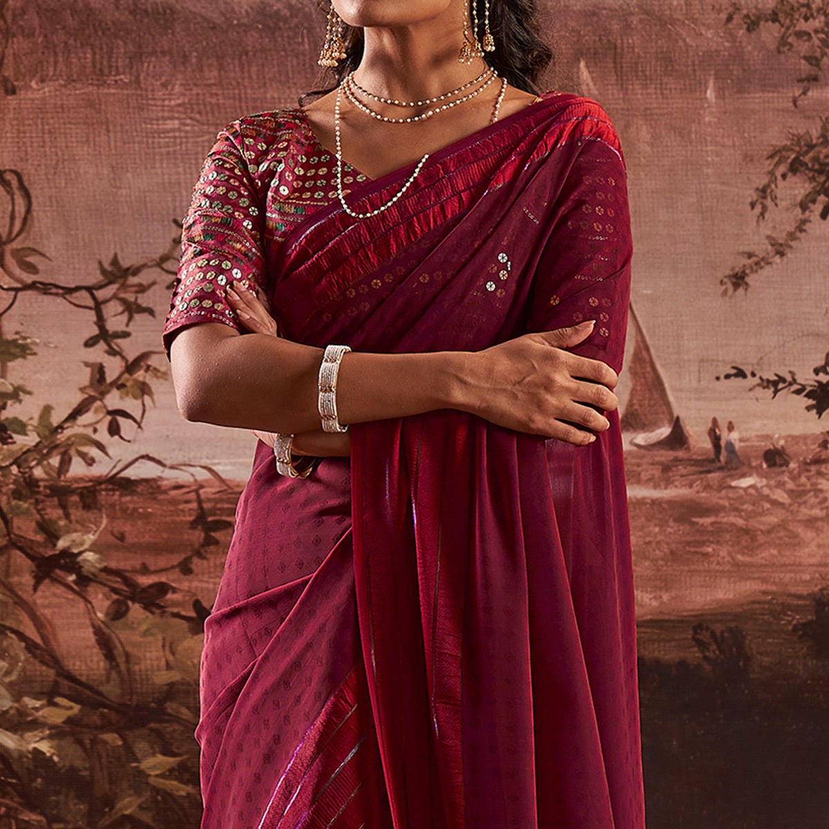 Wine Woven Georgette Saree With Tassels