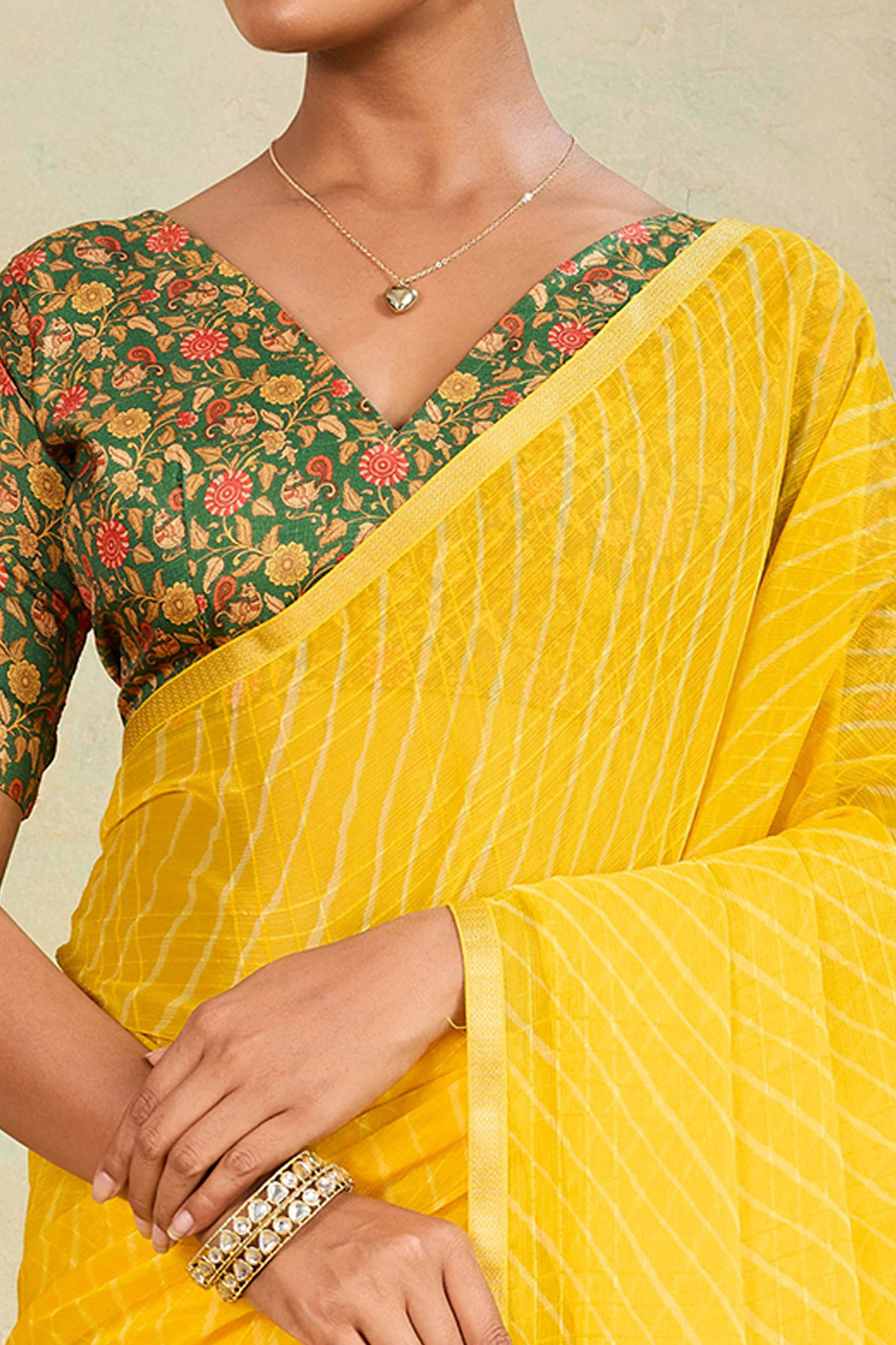 Yellow Leheriya Chiffon Saree Accented With Elegant Zari Lace Border Work