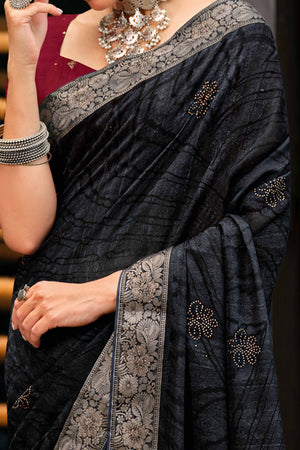 Black Abstract Printed Georgette Saree Enhanced with Subtle and Shiny Stone Work