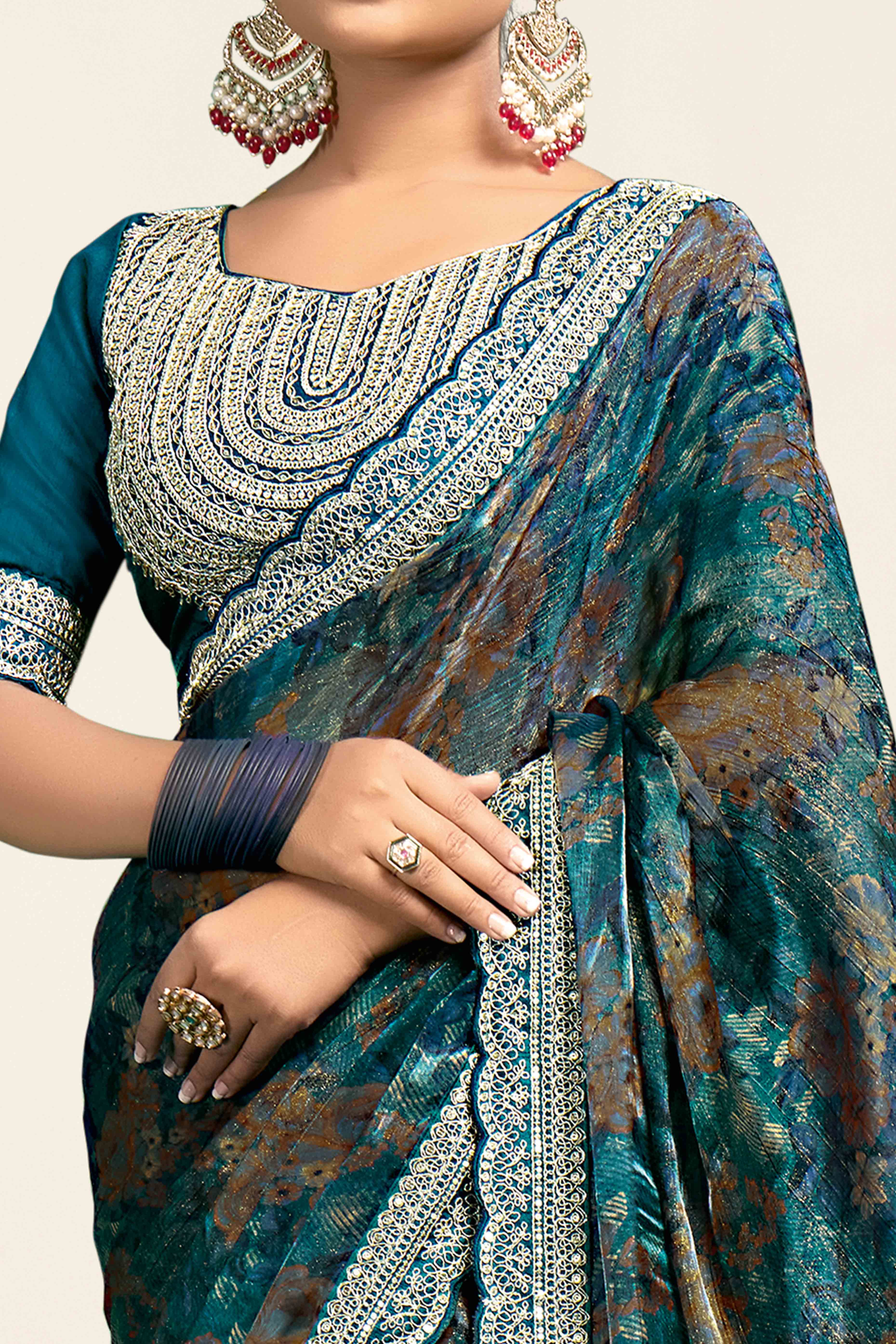 Teal Floral Printed Jimmy Choo Chiffon Saree With Embroidery On Border