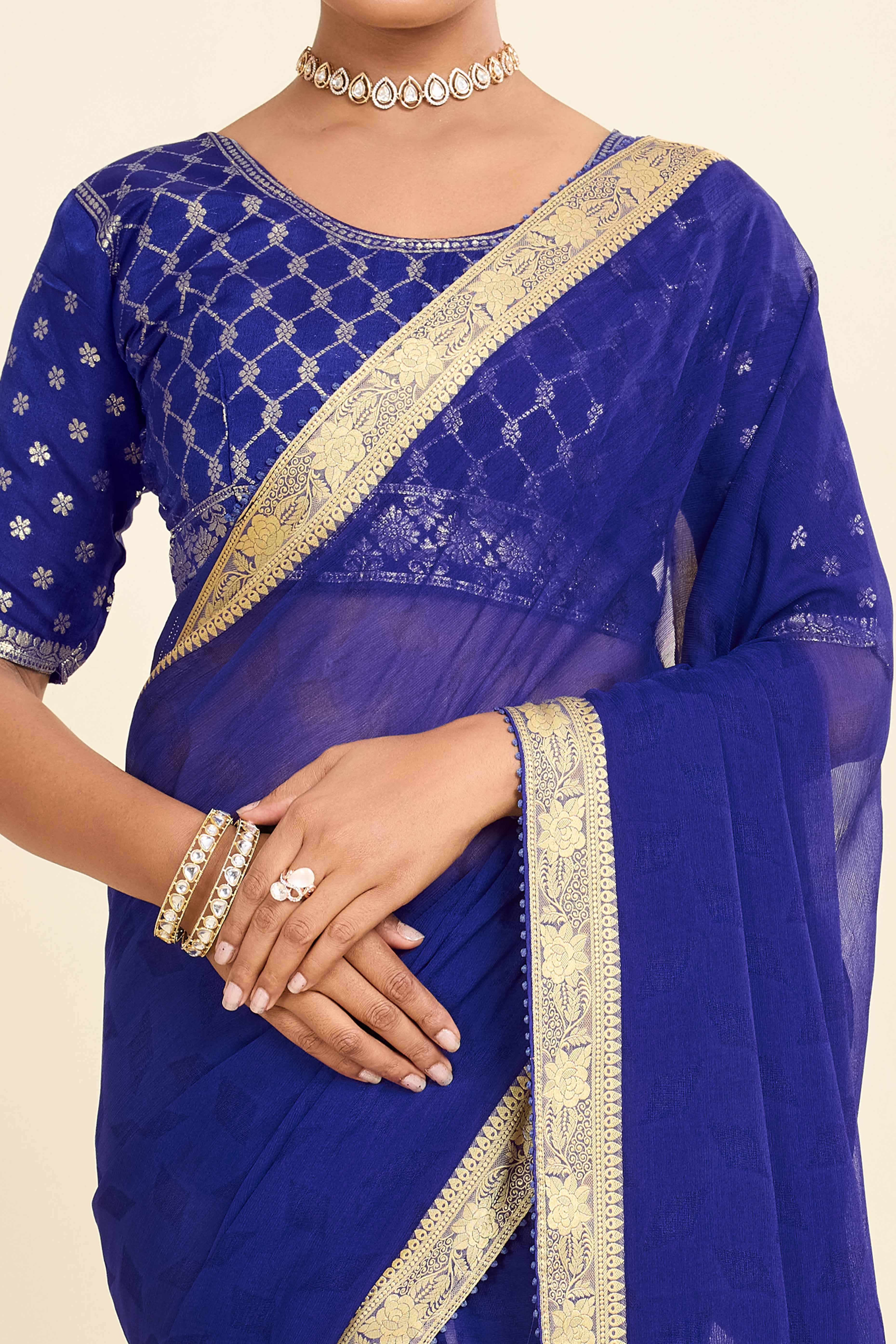 Blue Printed Chiffon Saree with Intricate Woven Edging