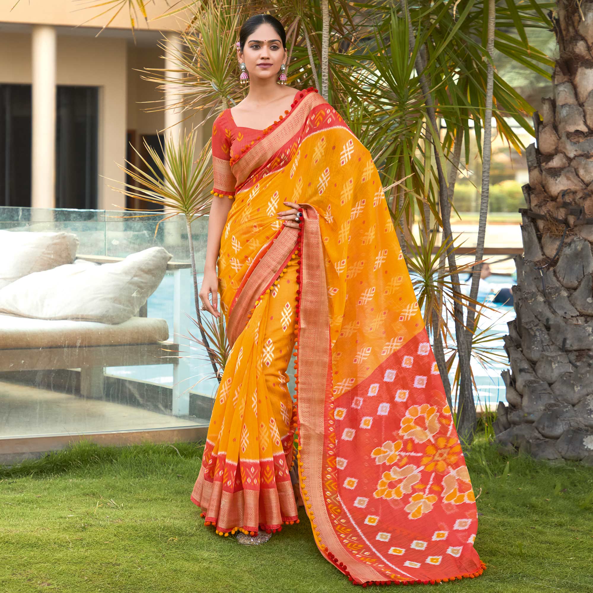 Orange Printed Pure Cotton Saree With Pum Pum Border